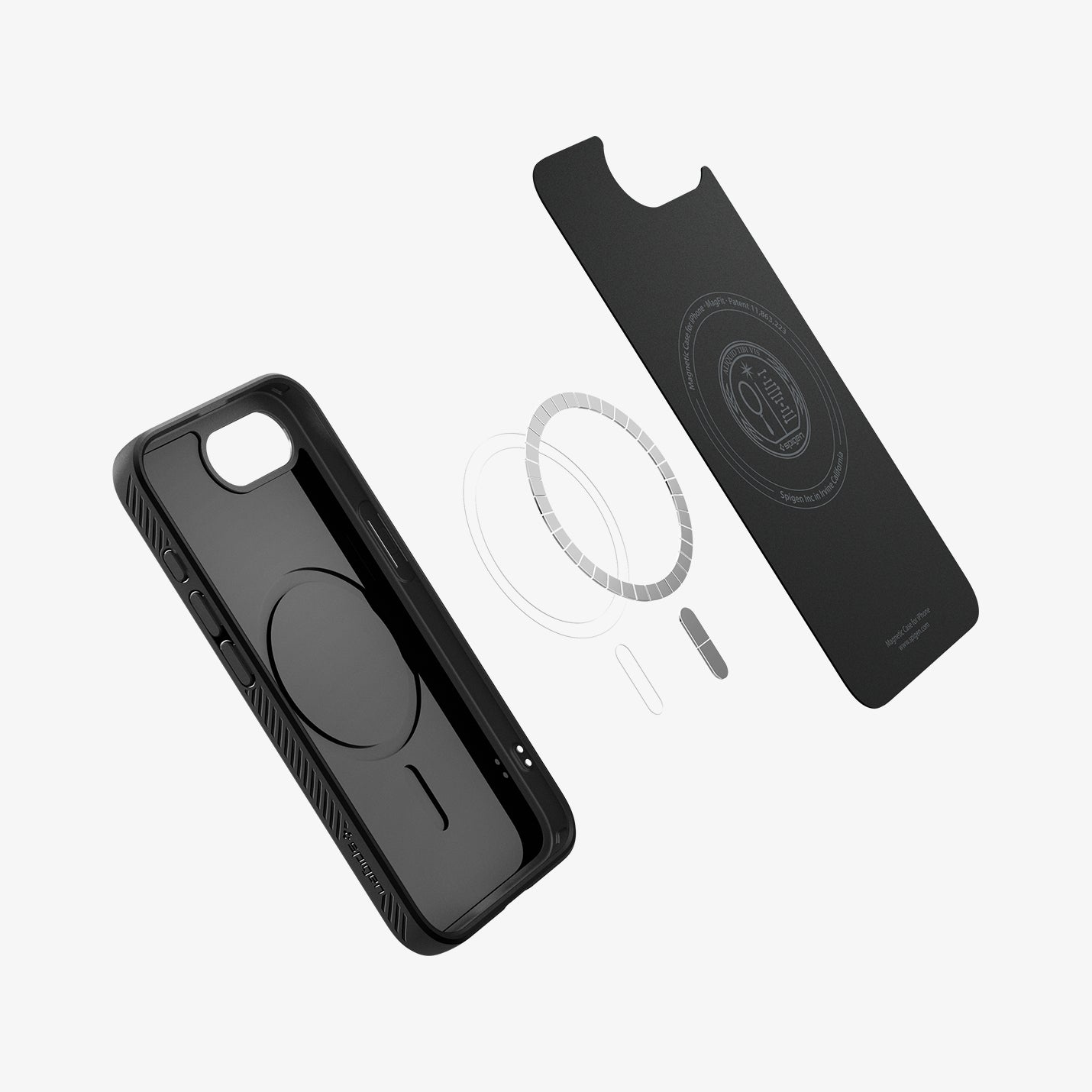 Schwarze iPhone-Hülle und Magnetring auf weißem Hintergrund.