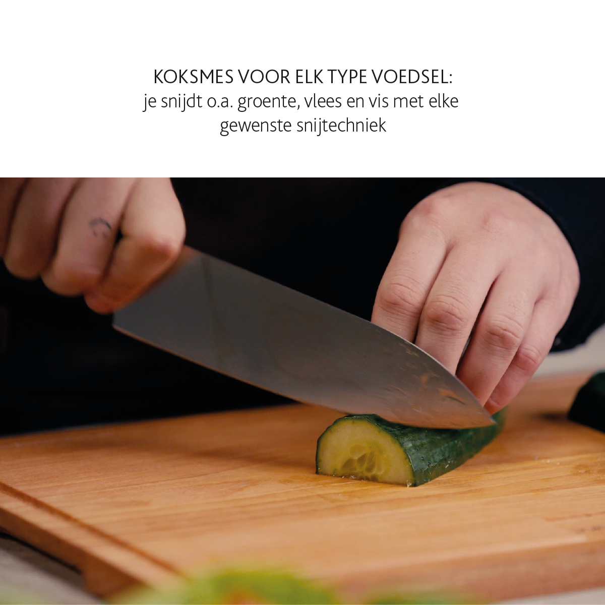 Hands chopping cucumber on a wooden board with a knife.