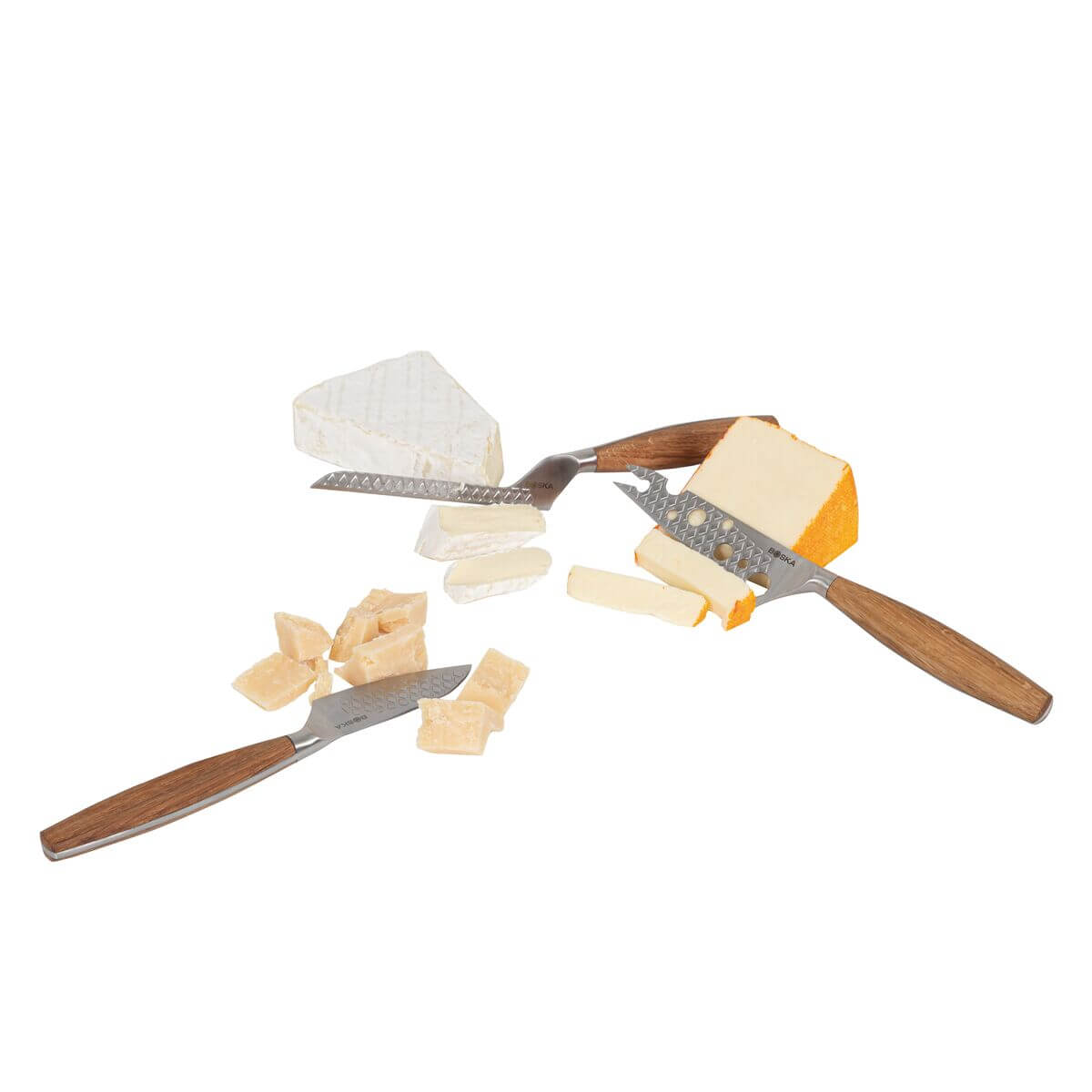 Various cheeses and knives with wooden handles arranged on a white background.