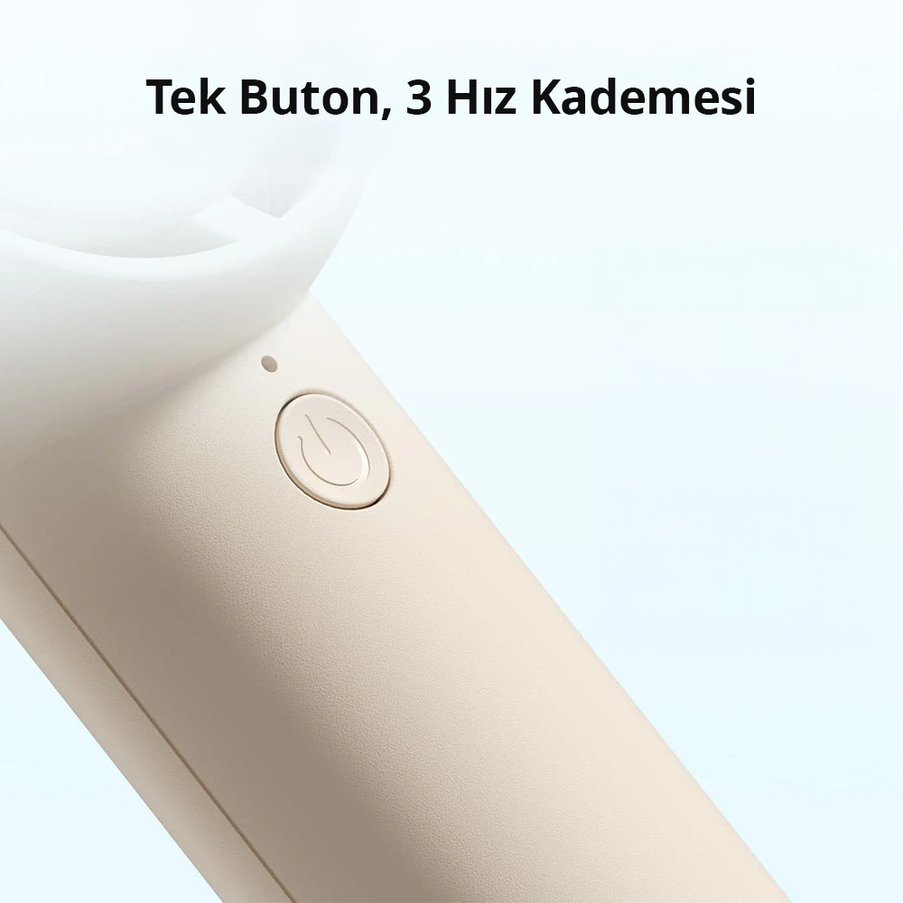 Bej rengi bir cihazda güç sembollü bir düğme.