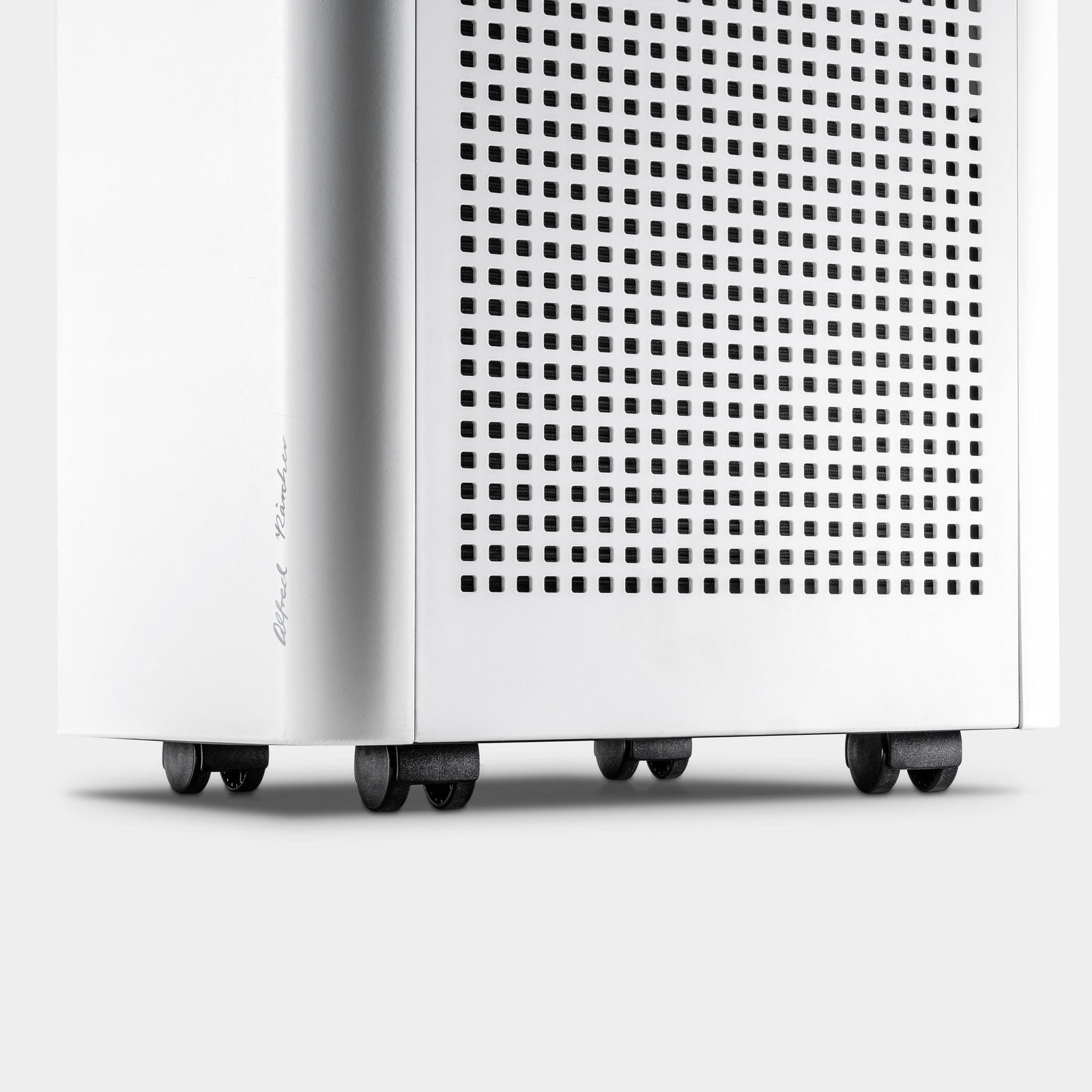 A silver air purifier with wheels and a perforated side.