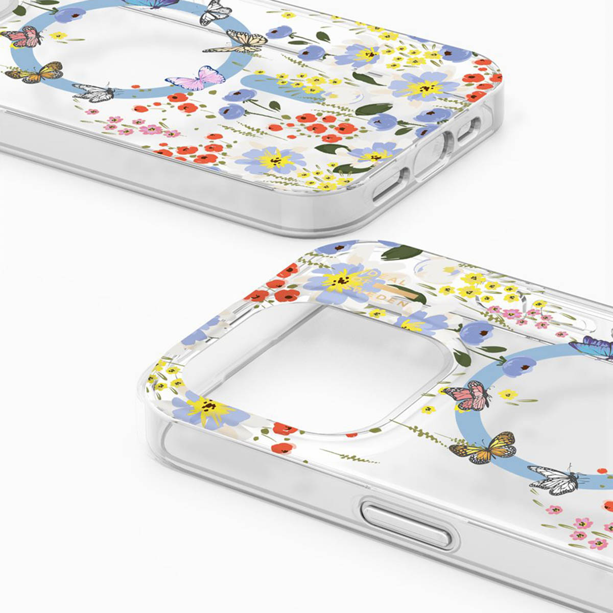 Transparente Handyhüllen mit Blumen und Schmetterlingen, auf weißem Hintergrund.