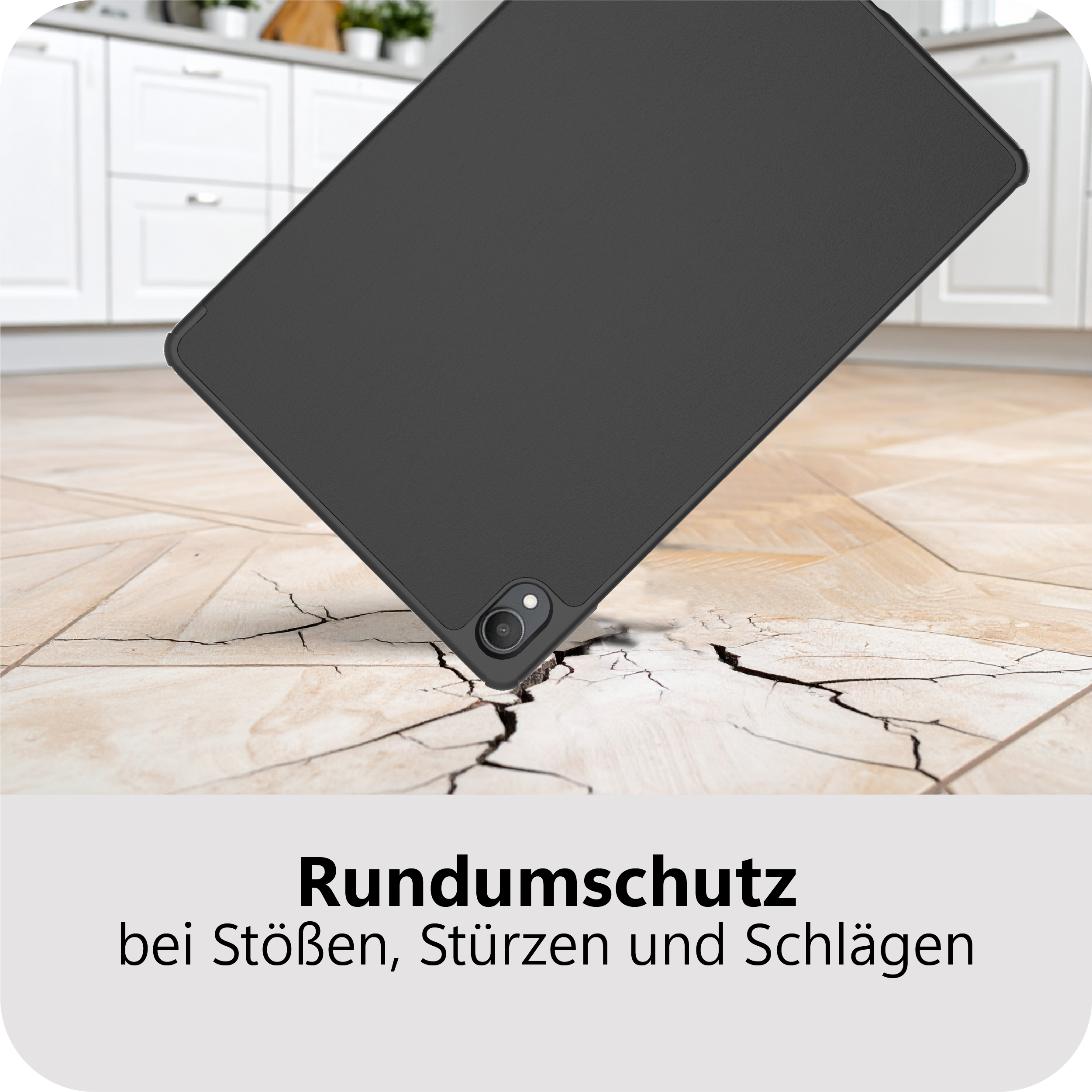 Schwarzes Tablet fällt auf zerbrochenen Boden.