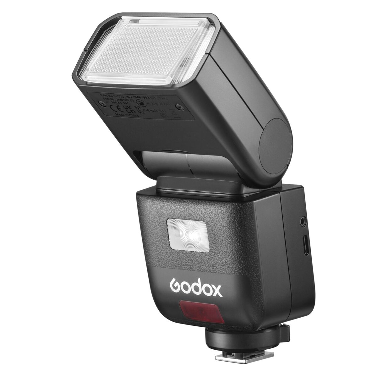 Schwarzer Godox Kamerablitz mit weißem Lichtdiffusor und silbernem Fokuslicht.