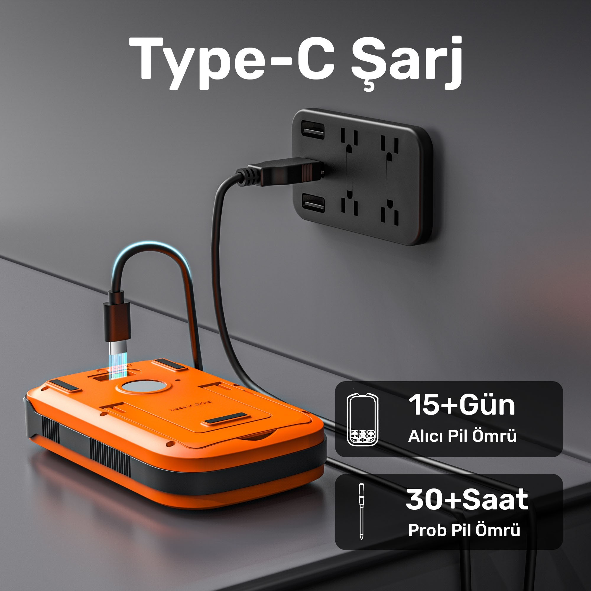 Turuncu powerbank, siyah çoklu prize USB-C ile bağlanıyor.