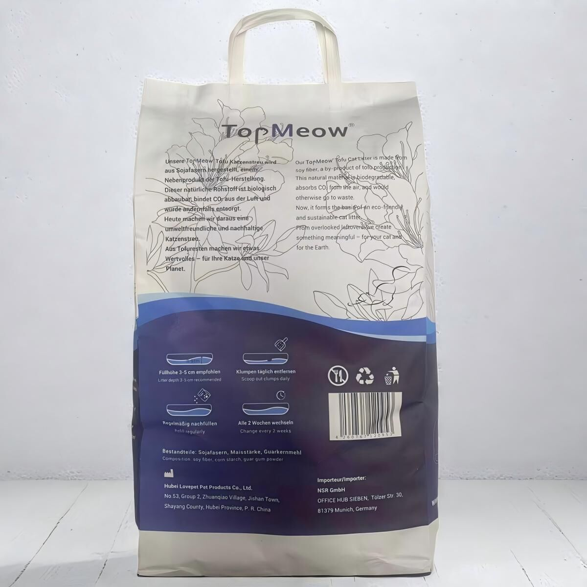 Una bolsa de arena para gatos TopMeow Tofu con información del producto en alemán e inglés.