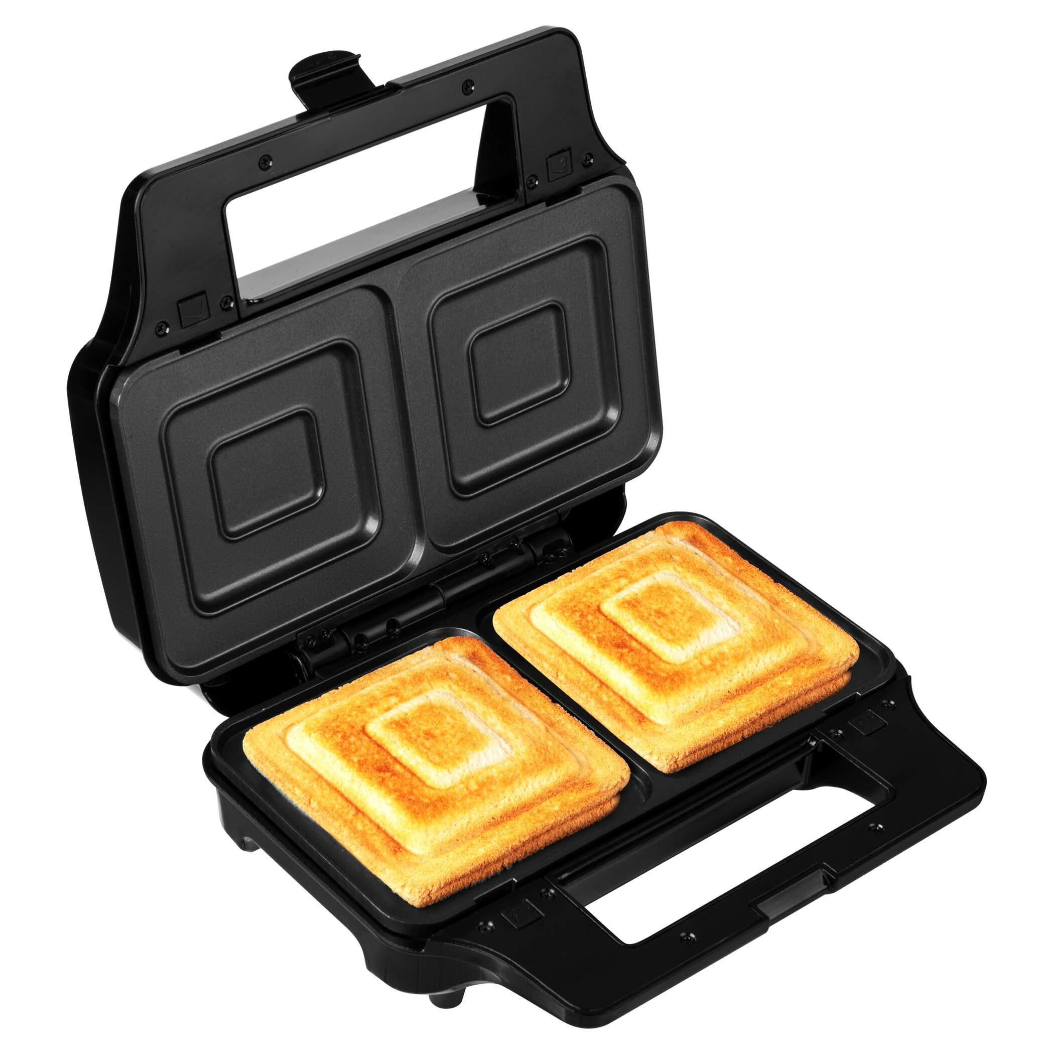 Ein offener schwarzer Sandwichmaker mit zwei goldbraunen Sandwiches.