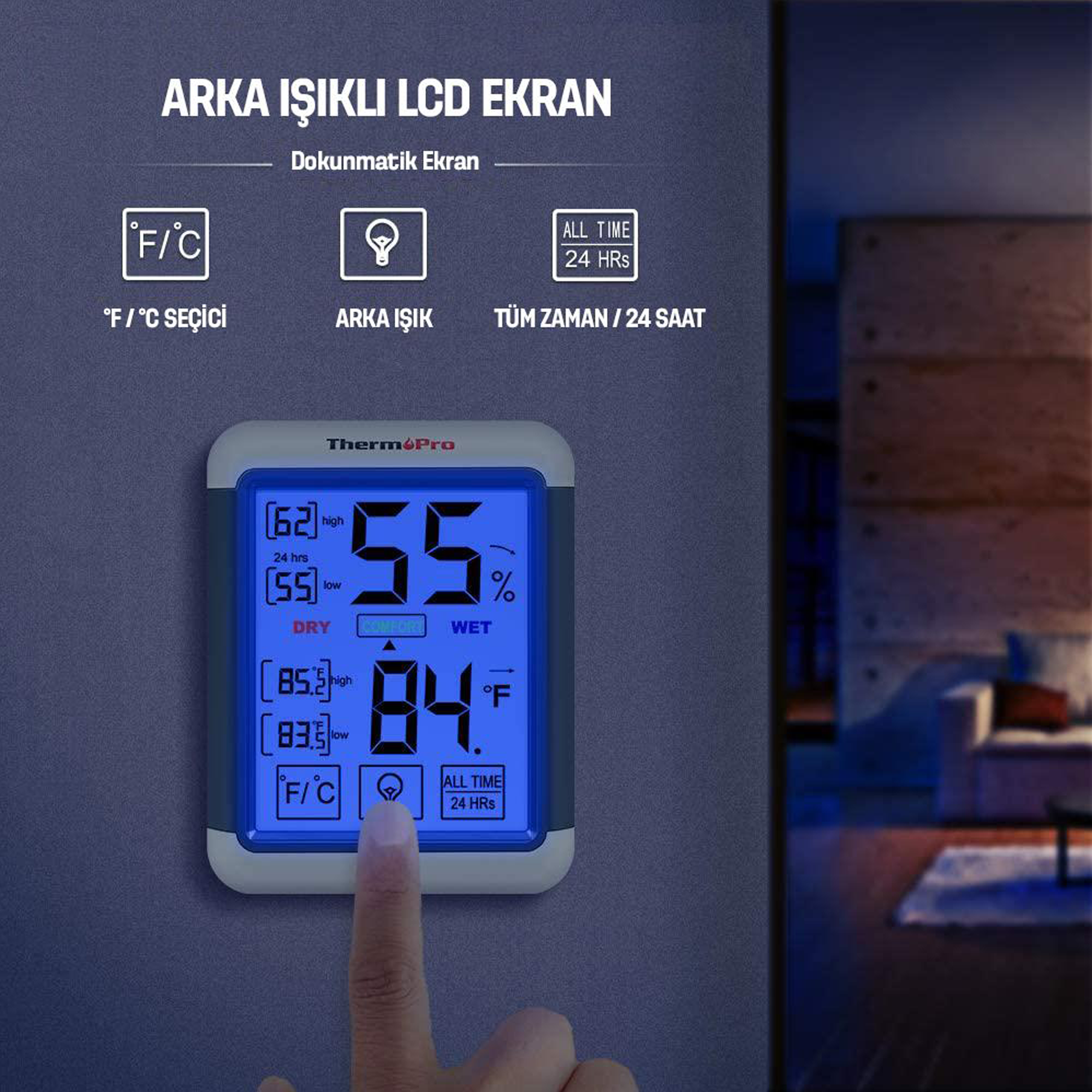 Mavi ekranlı bir ThermoPro higrometresine bir parmak dokunuyor.