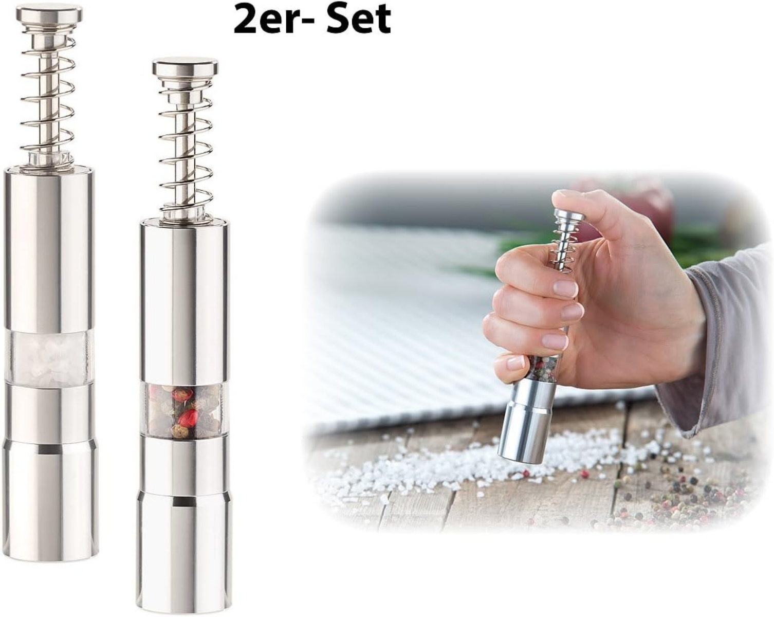 Zwei Edelstahl-Gewürzmühlen, eine gefüllt mit Salz, die andere mit Pfefferkörnern.