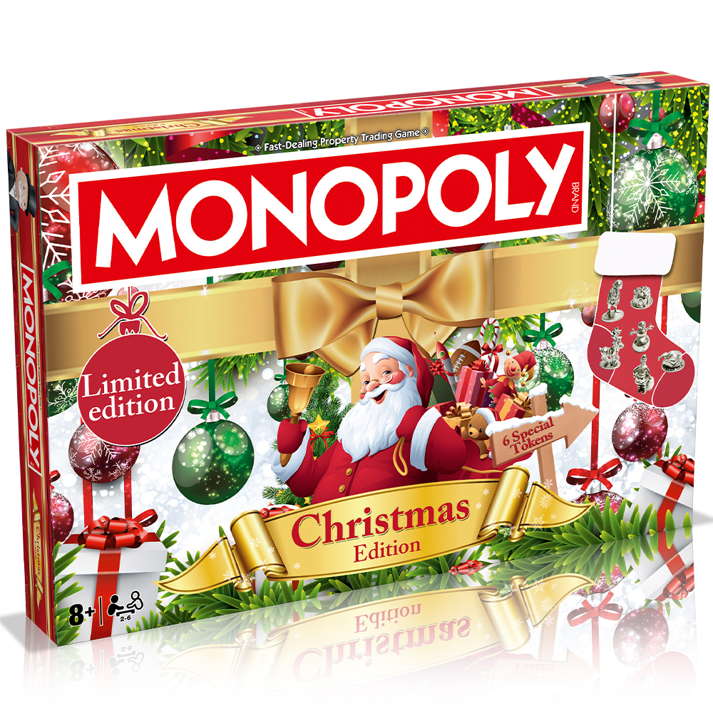 Scatola del gioco Monopoly Edizione Natale con Babbo Natale, regali, ornamenti e nastro dorato.