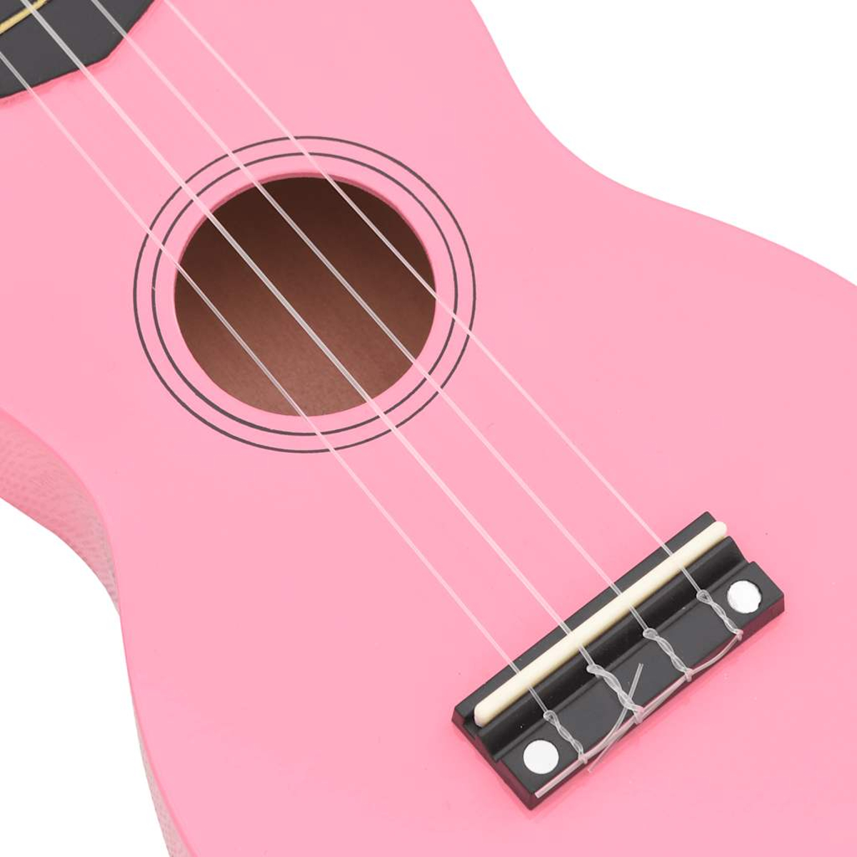 Nahaufnahme einer rosafarbenen Ukulele mit vier Saiten und einem Schallloch.