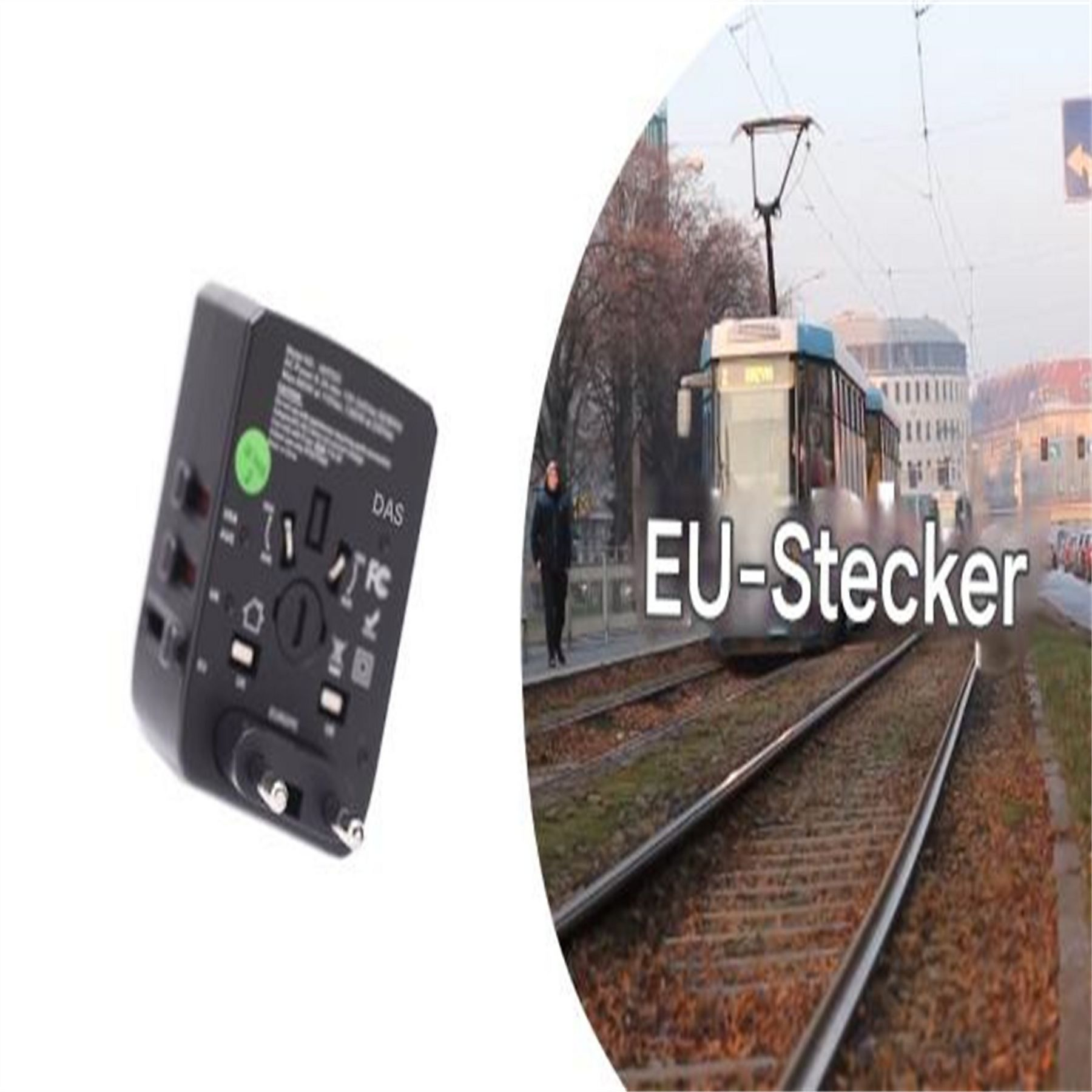 Schwarzer Reiseadapter neben einer Straßenbahn auf Gleisen.