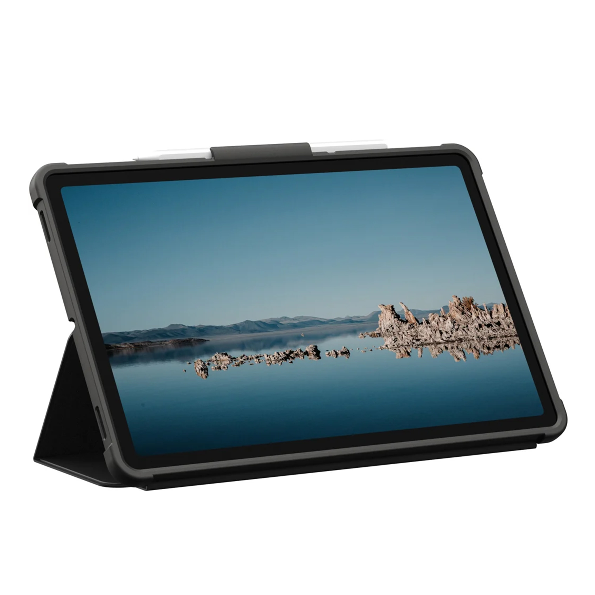 A tablet with a stand displays a landscape with rocks in water.