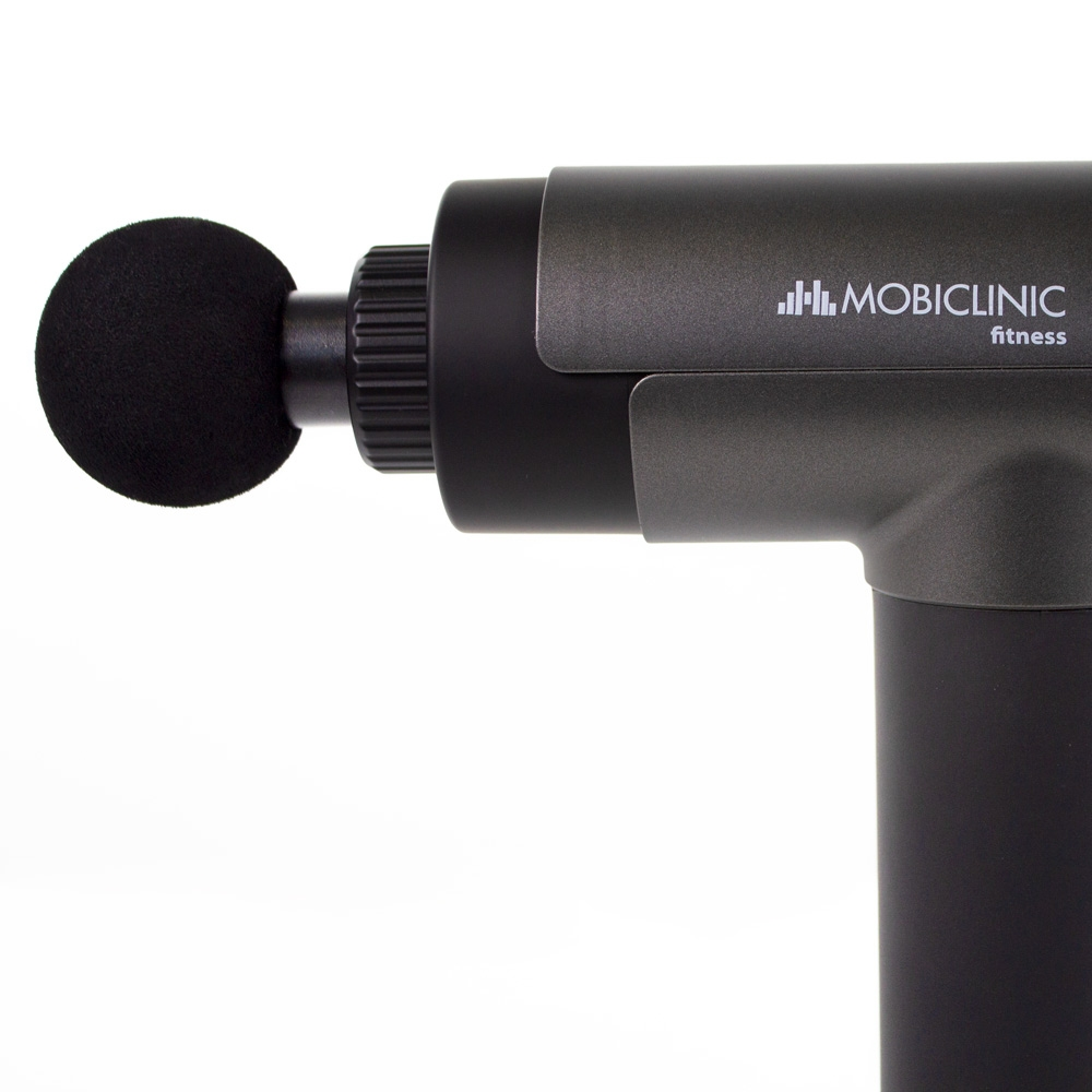 Pistola de masaje gris oscuro con accesorio negro redondeado.