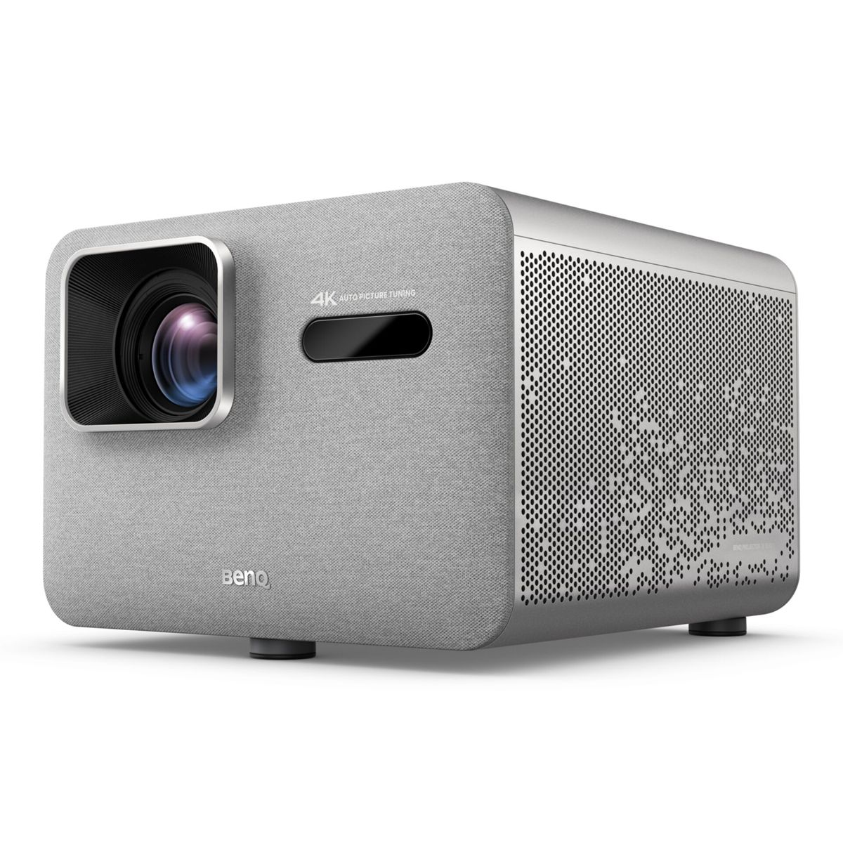 Projecteur gris avec objectif à l'avant gauche et aérations à droite.