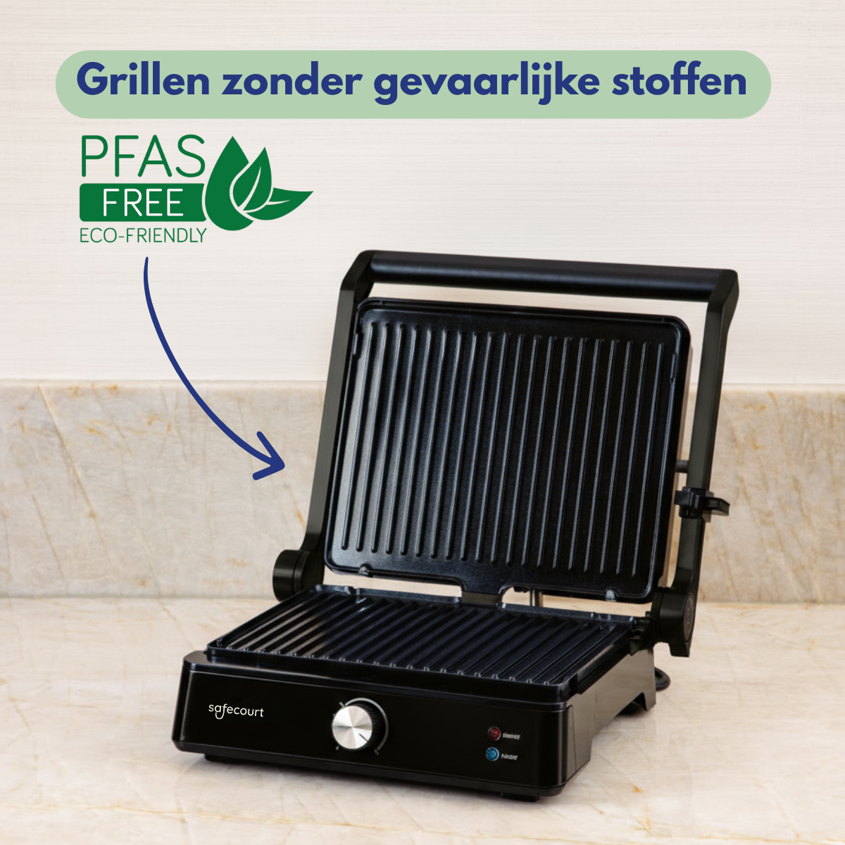 An open black contact grill sits on a marble countertop. "PFAS FREE ECO-FRIENDLY" is displayed on a green banner.