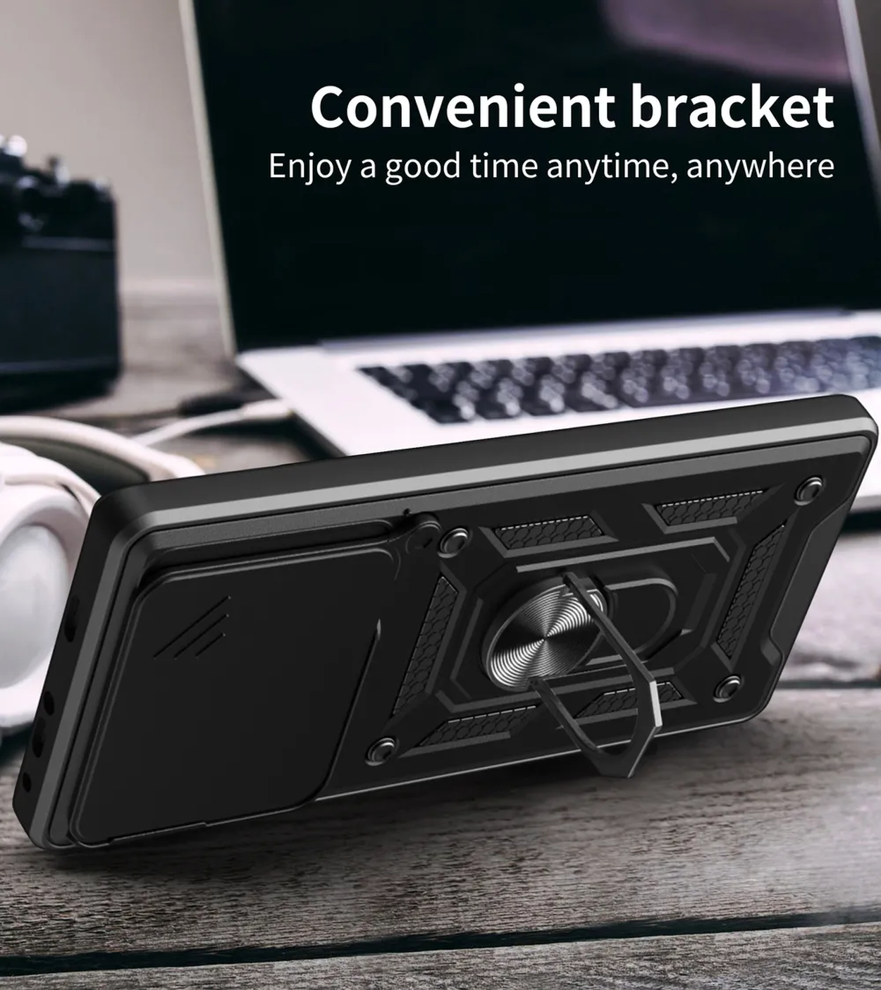 Coque de téléphone noire avec support bague, ordinateur portable et casque.