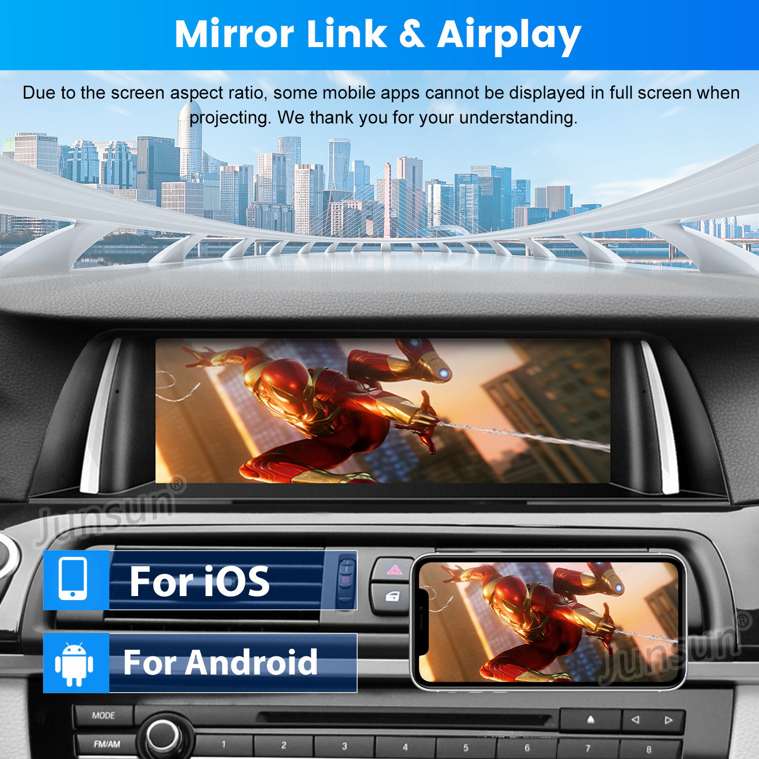 Un sistema di infotainment per auto mostra uno skyline cittadino e Spiderman su due schermi.