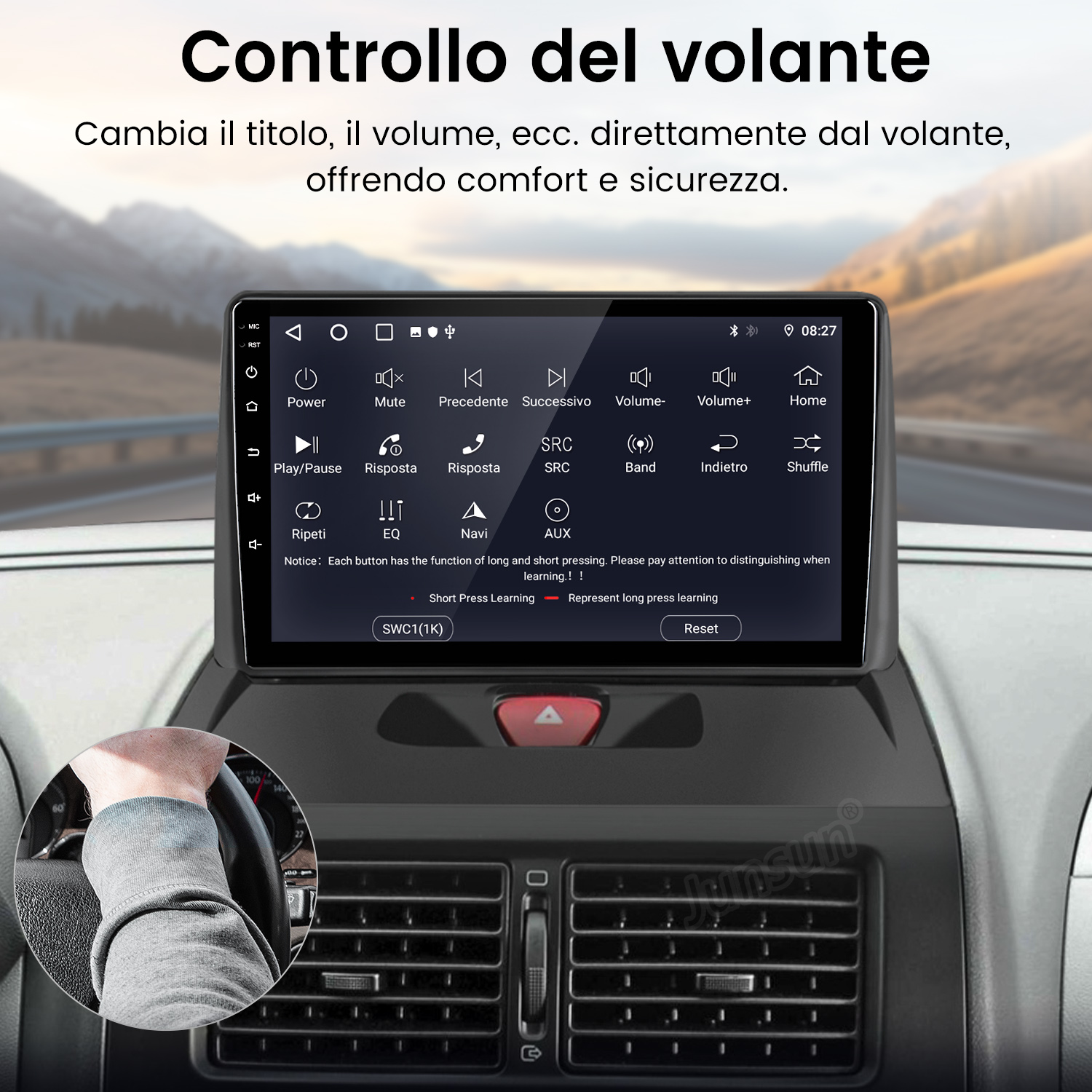 Display auto mostra controlli volante con icone per volume, riproduzione e navigazione.