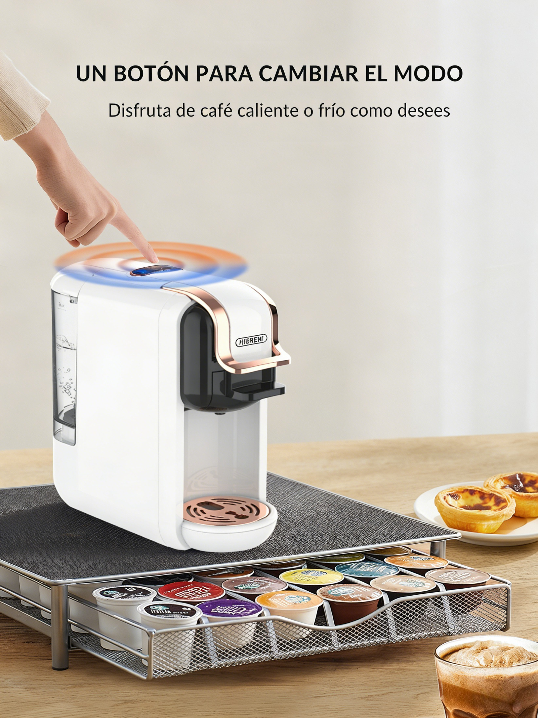 Una cafetera blanca con un cajón lleno de cápsulas de café.