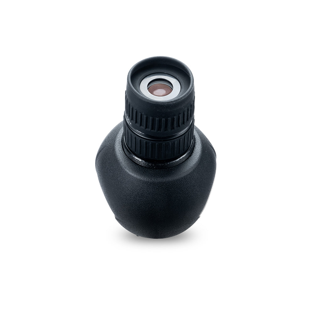 Un monocular negro con superficie texturizada, aislado sobre fondo blanco.