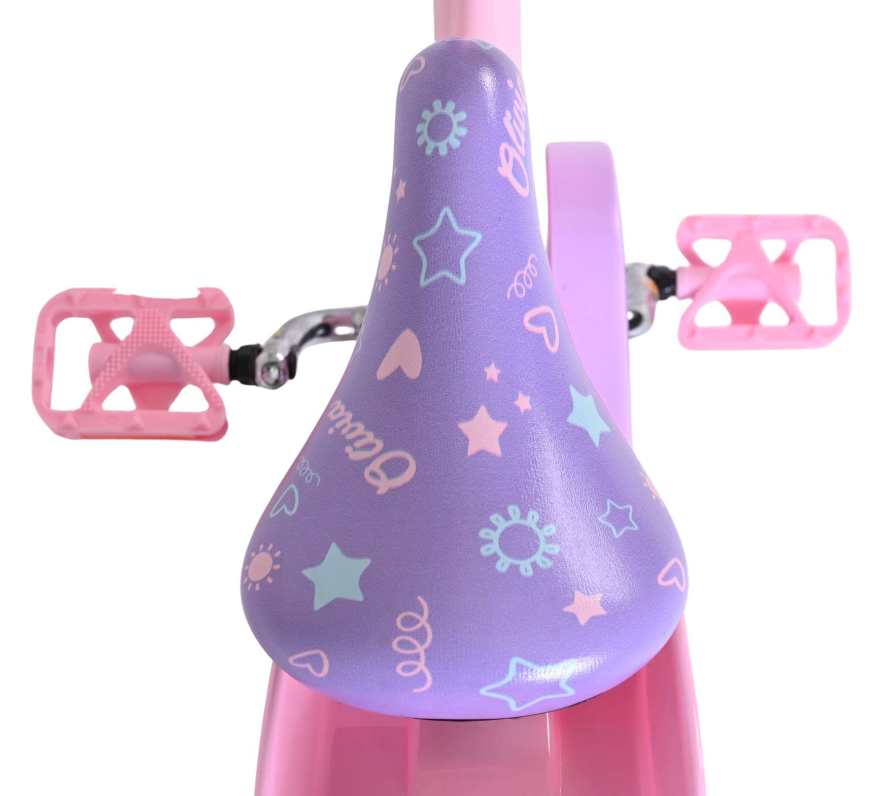 Lila Fahrradsattel mit Sternen/Herzen, rosa Pedale und pinker Rahmen.