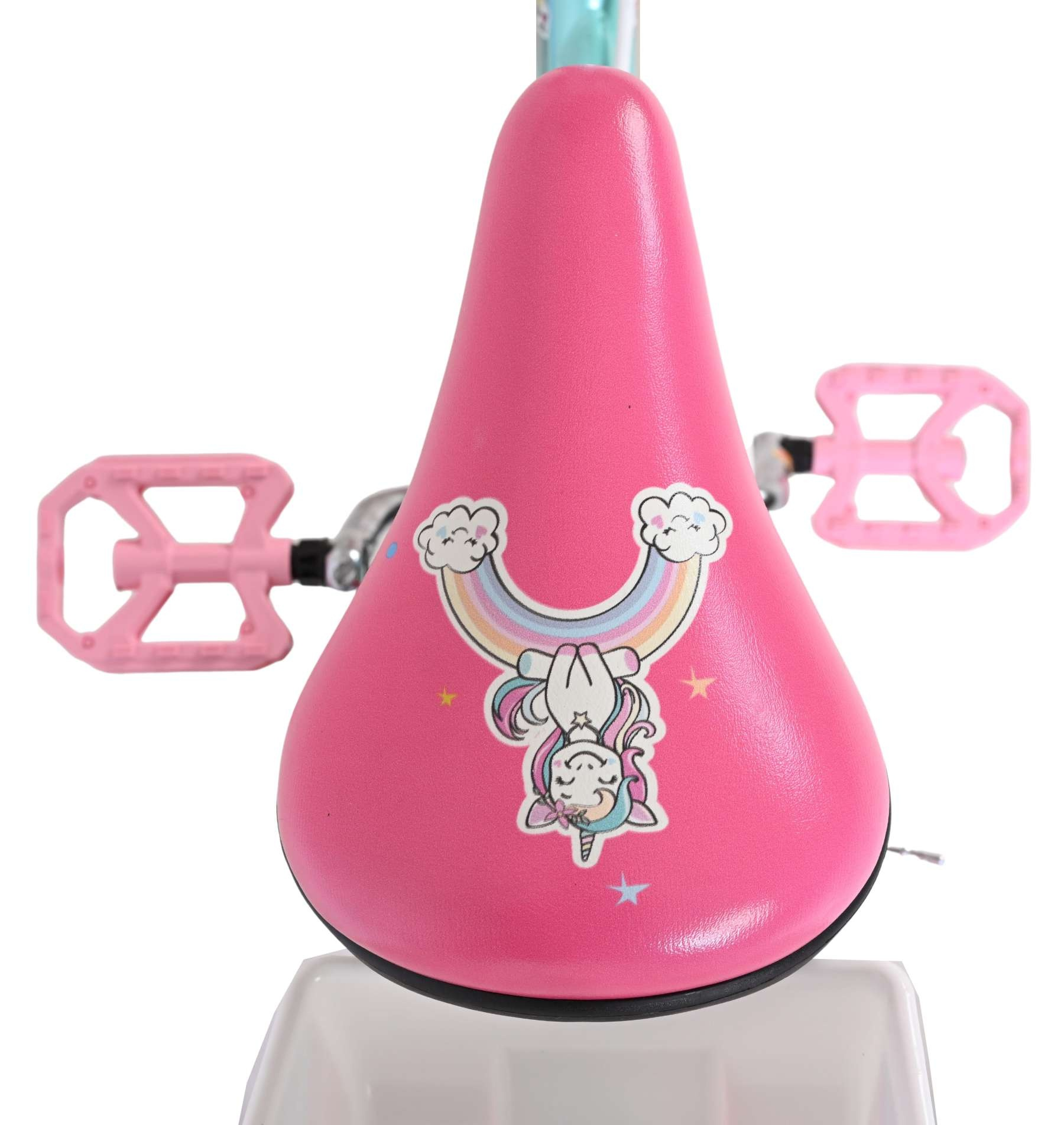 Rosa Fahrradsattel mit Einhorn- und Regenbogen-Aufkleber, rosa Pedale.
