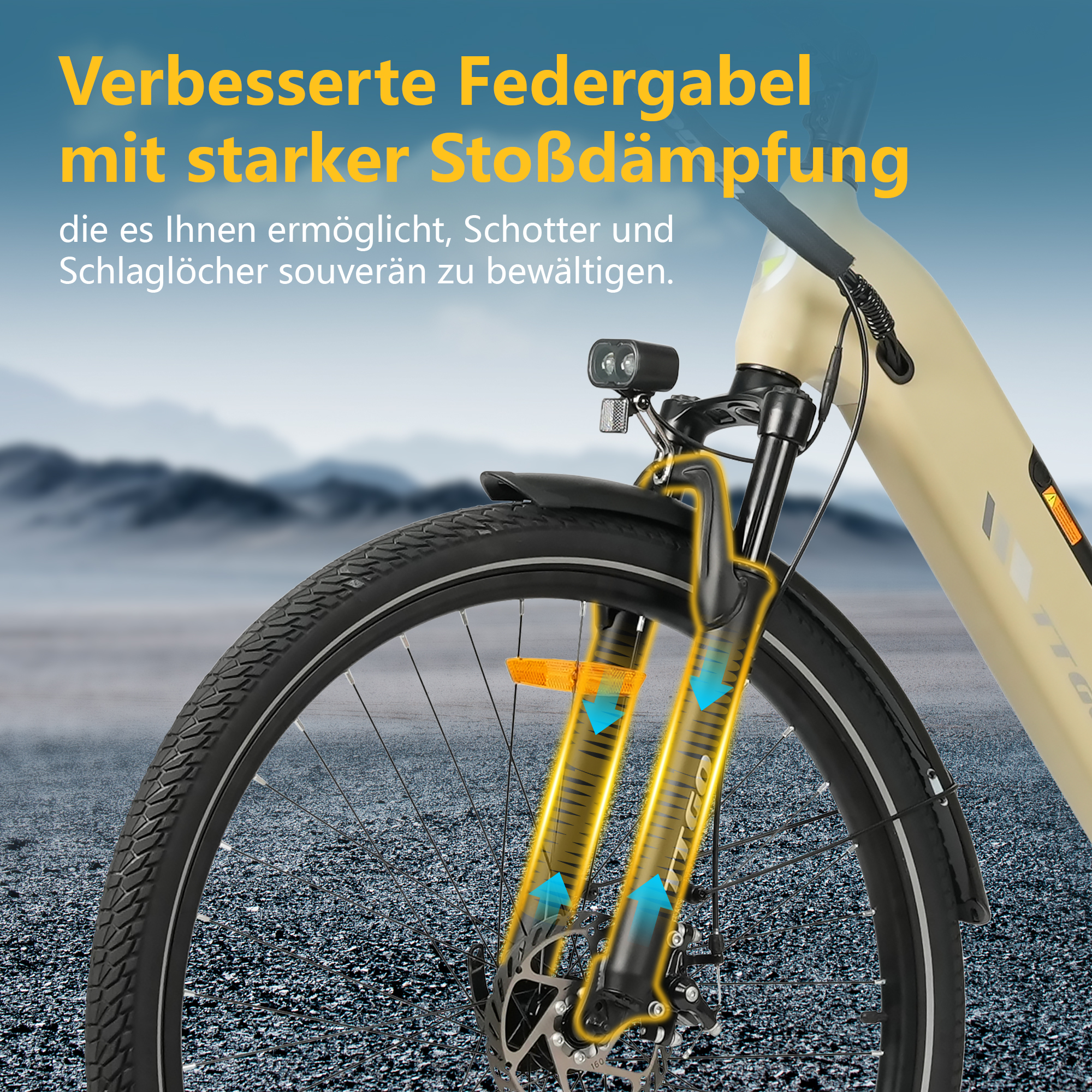 Gelbe Gabel mit Stoßdämpfung, Fahrradvorderreifen, Berglandschaft im Hintergrund.