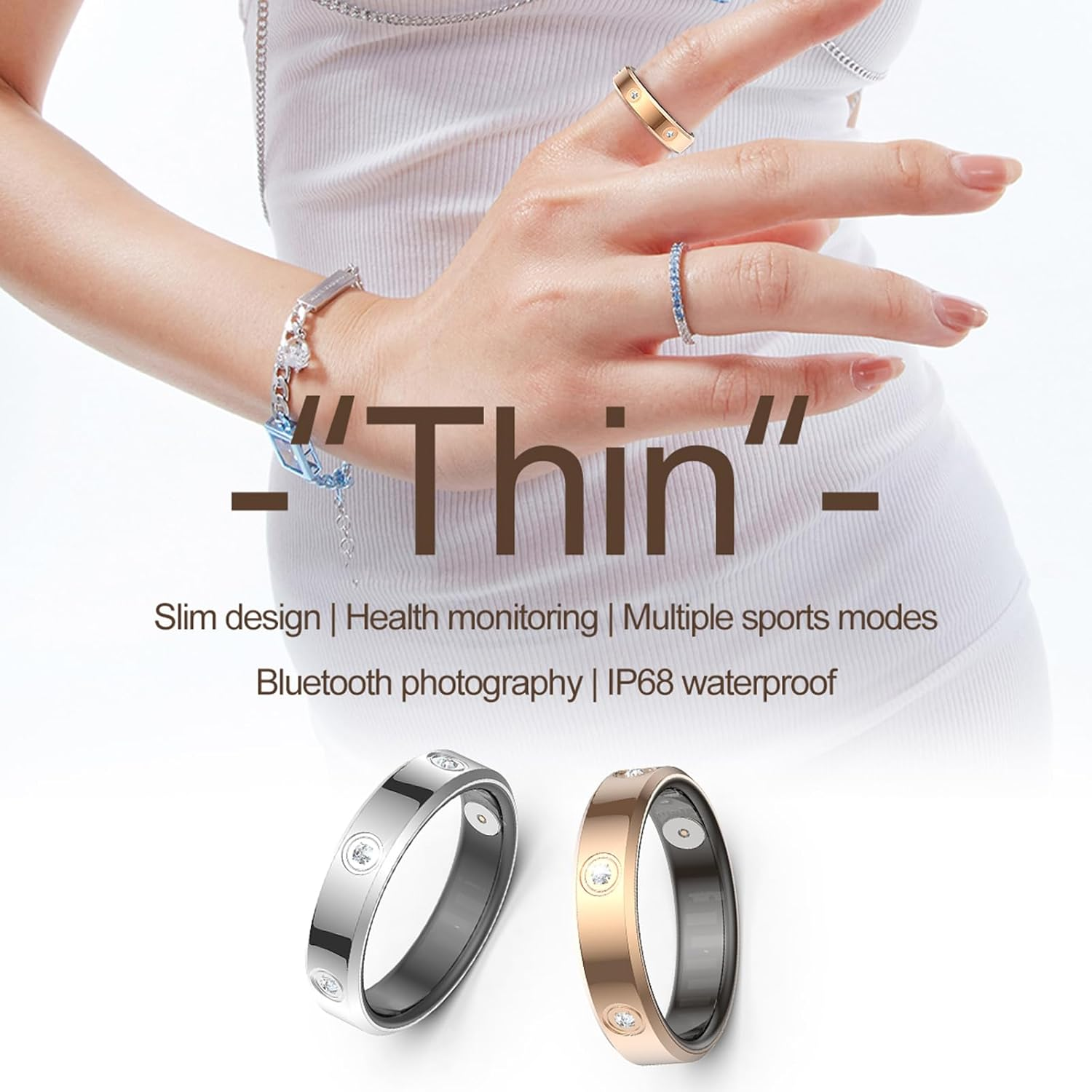 Eine Hand mit Ringen und Armband, darunter zwei Smart-Ringe.