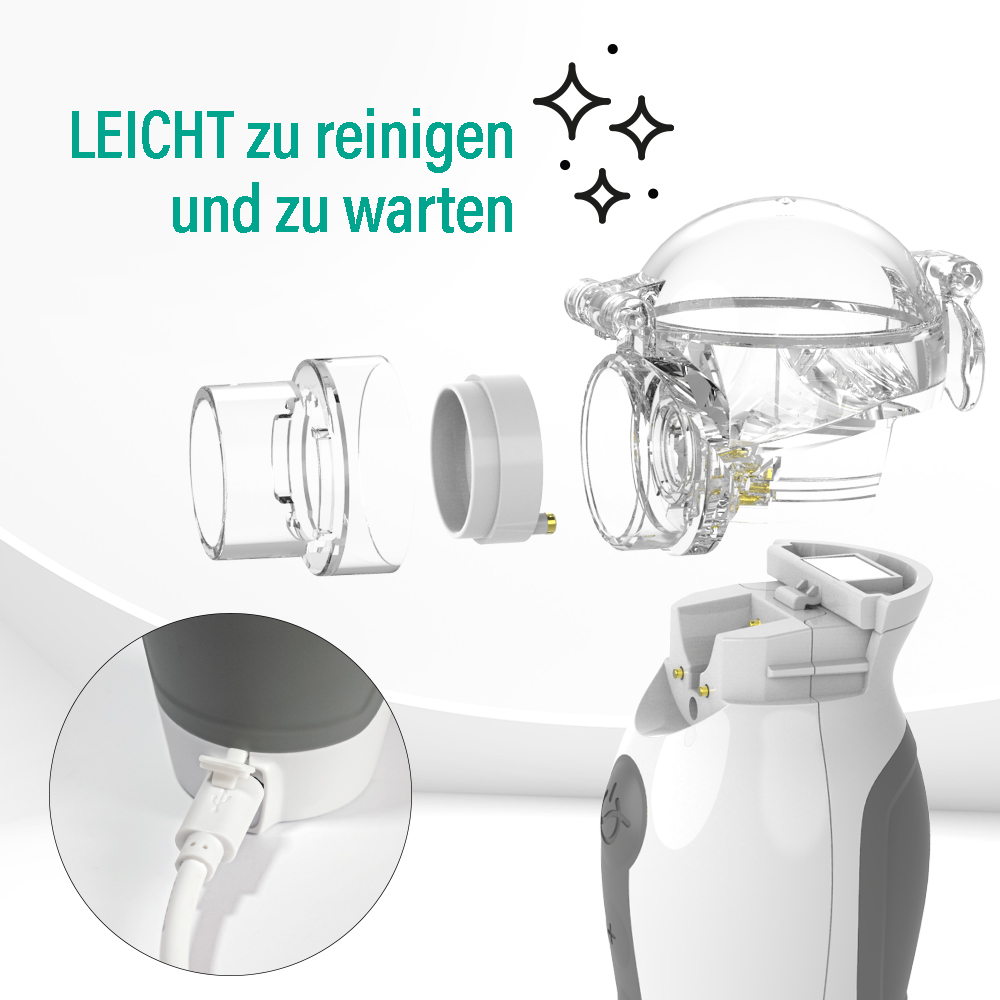 Ein zerlegter Vernebler mit Glasbehälter und weißem Handstück. Ladeanschluss sichtbar.
