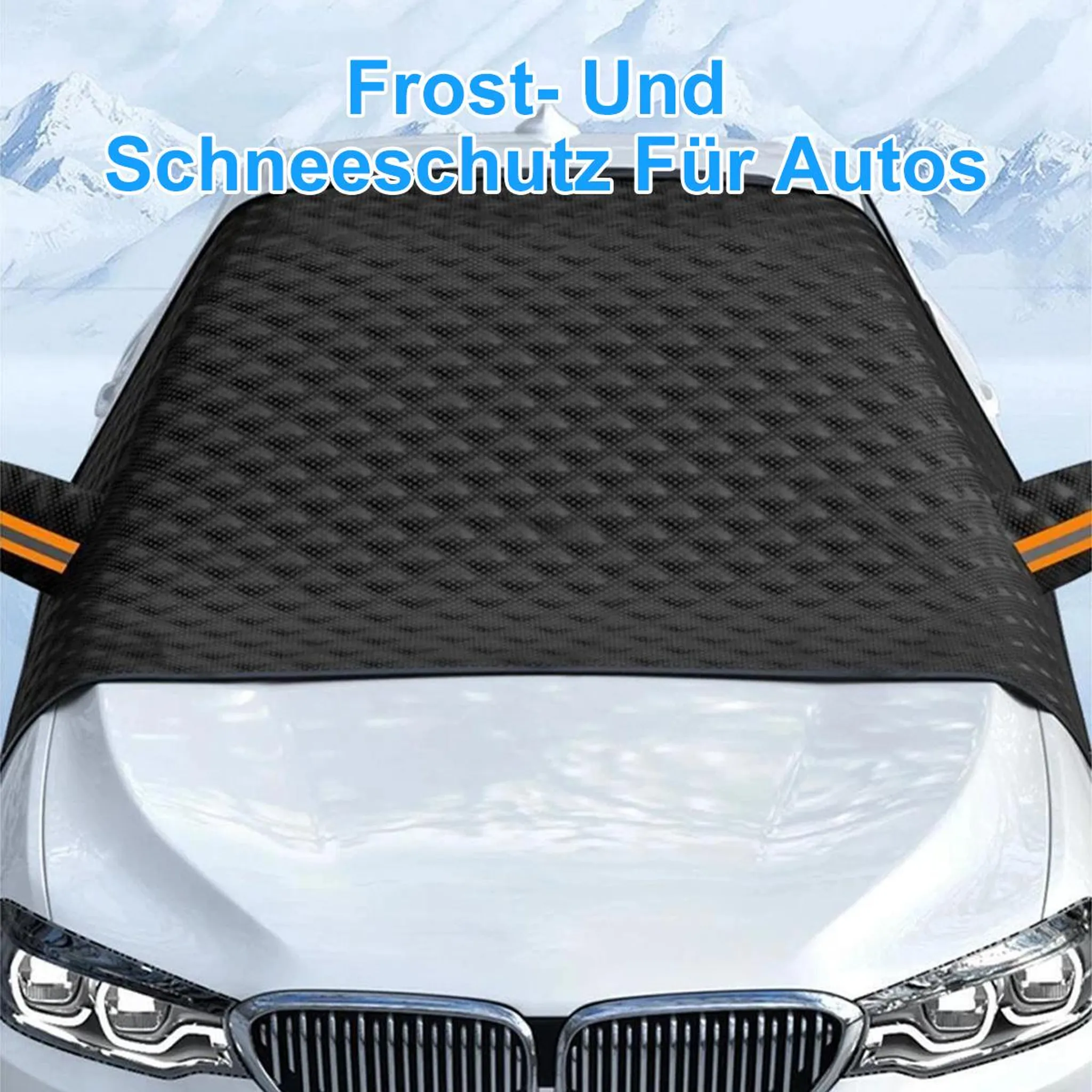 Schutzabdeckung auf einem weißen Auto vor schneebedeckten Bergen.