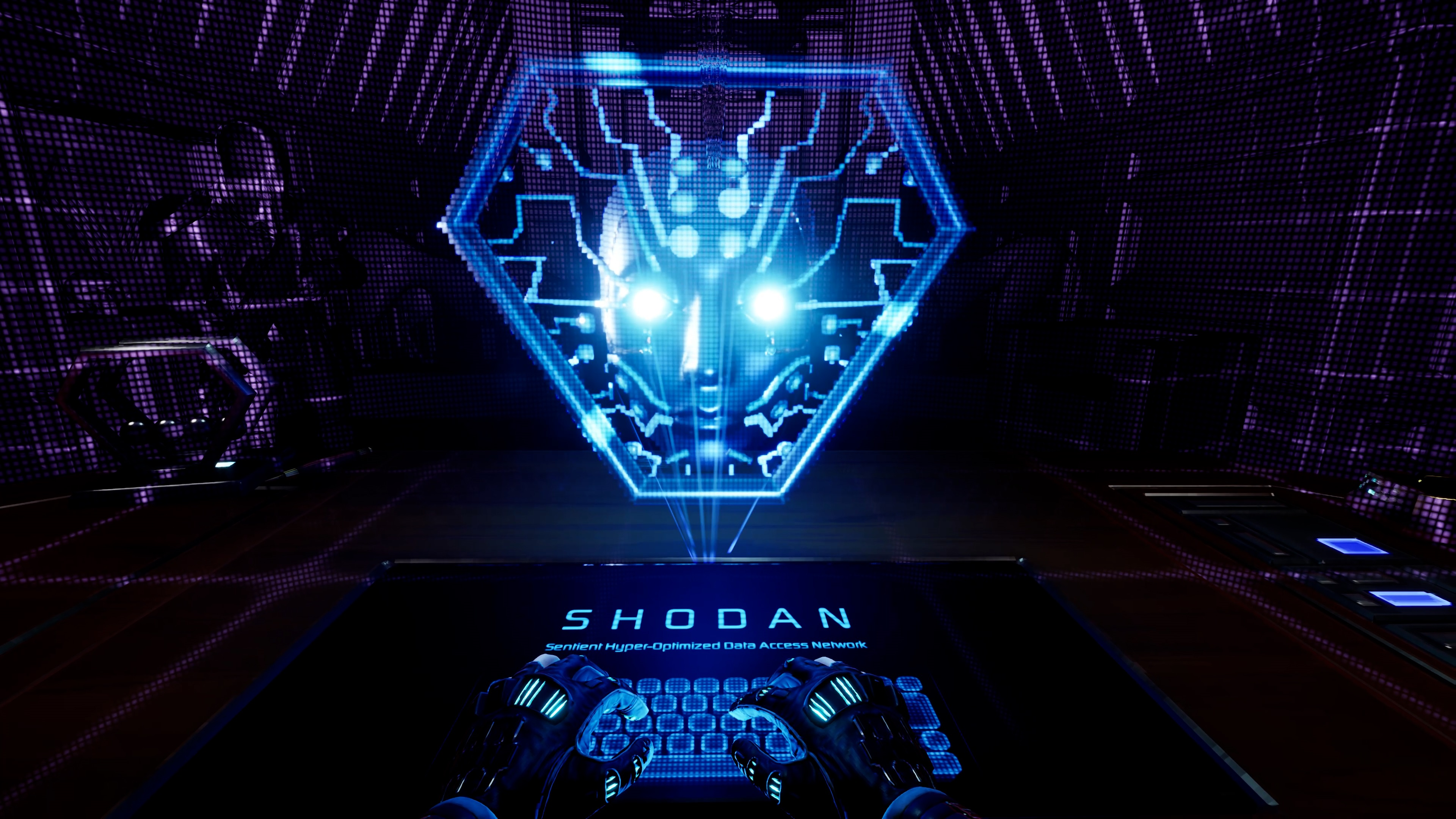 Sześciokątna twarz holograficzna ze świecącymi oczami nad klawiaturą z napisem SHODAN.