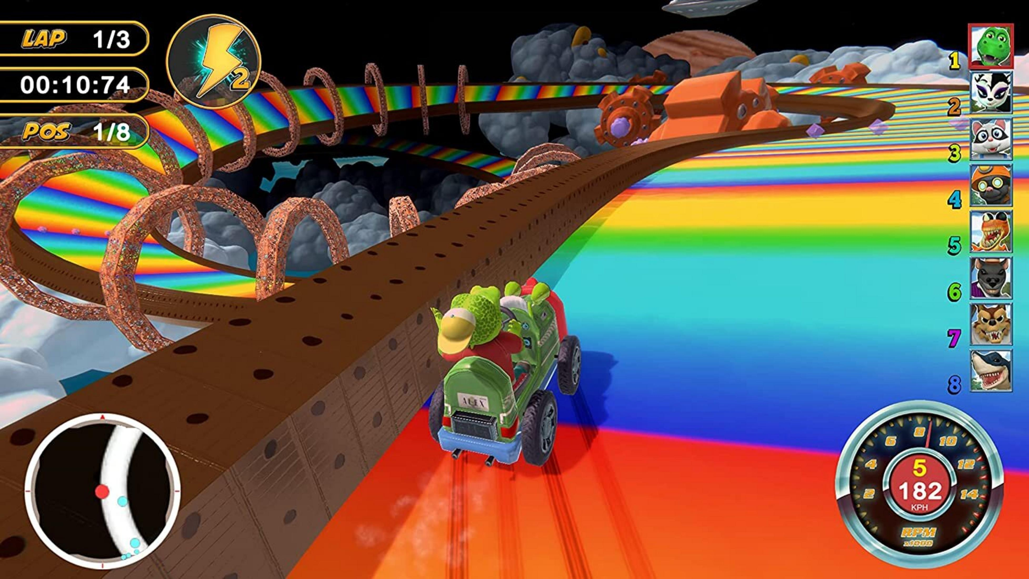 Zielony samochód z żabami ściga się po tęczowym torze obok chmur i spirali.