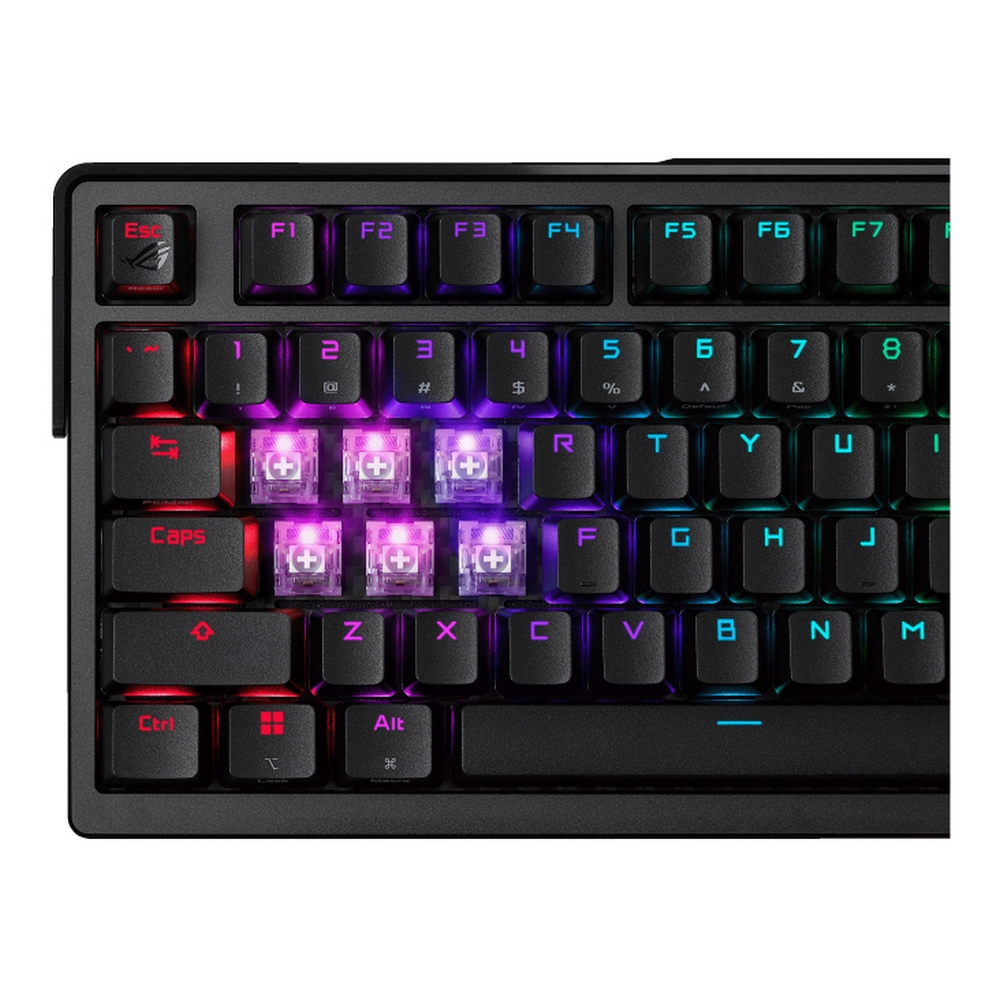 Nahaufnahme einer schwarzen Tastatur mit RGB-Beleuchtung, die lila Schalter beleuchtet.