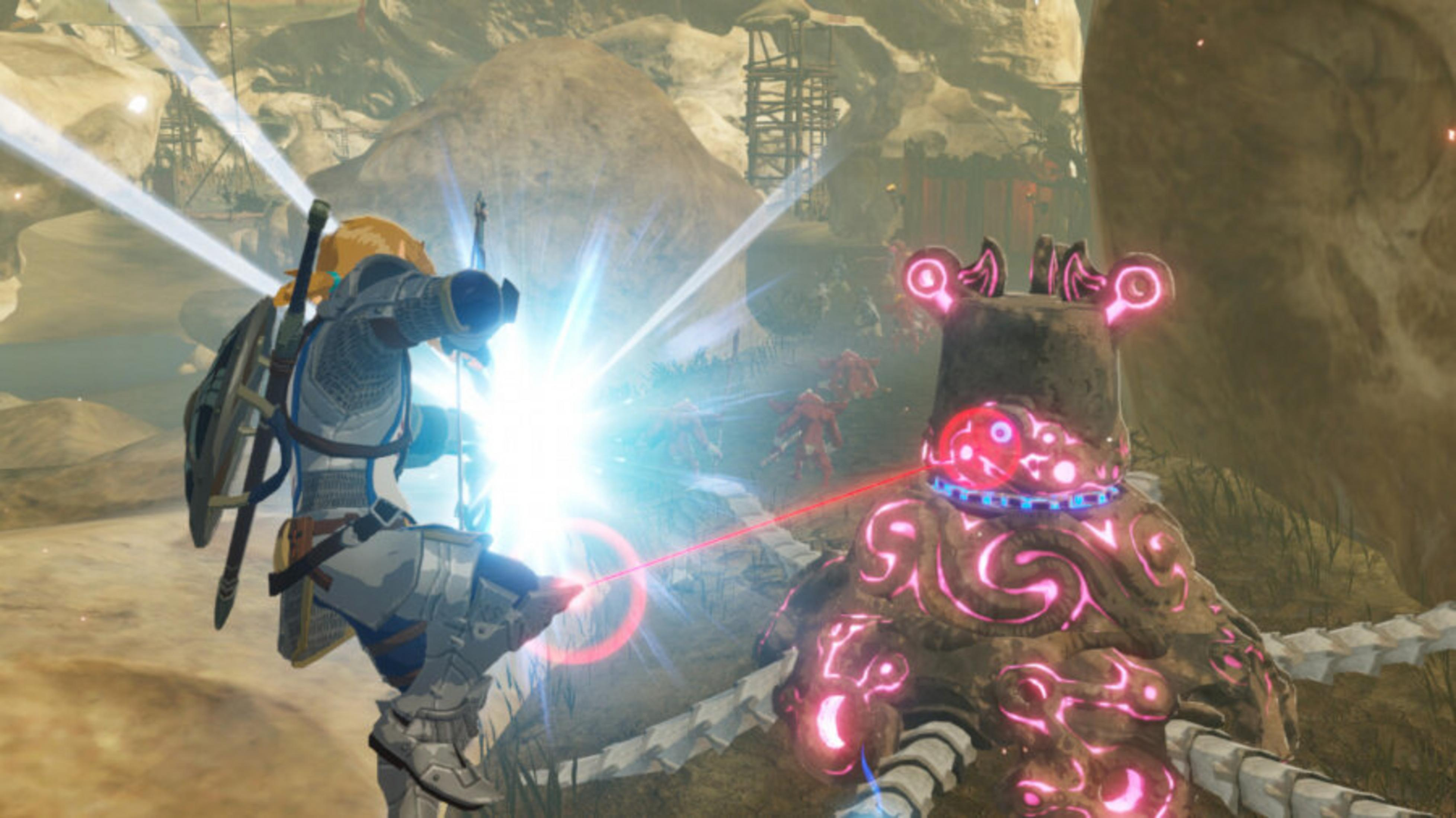 Wojownik strzela z łuku do mechanicznego wroga w skalistym krajobrazie.