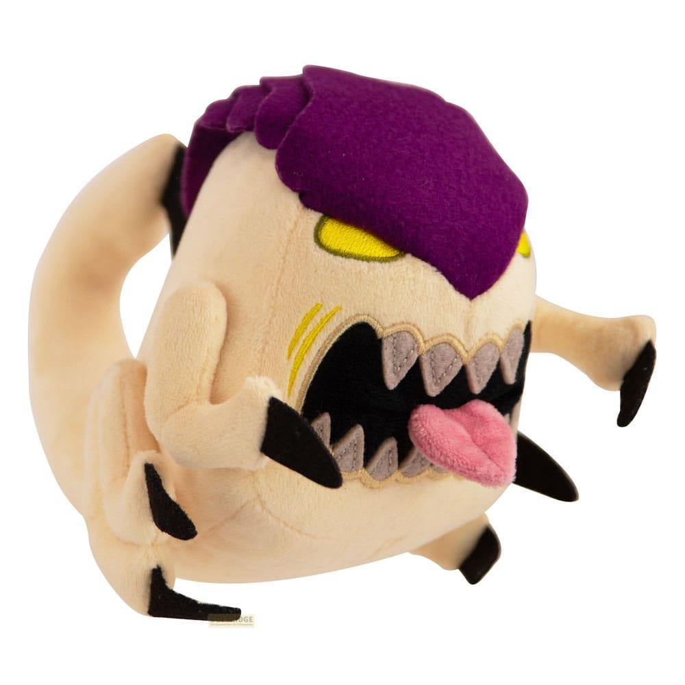 Un peluche color crema con capelli viola, occhi gialli e lingua fuori.
