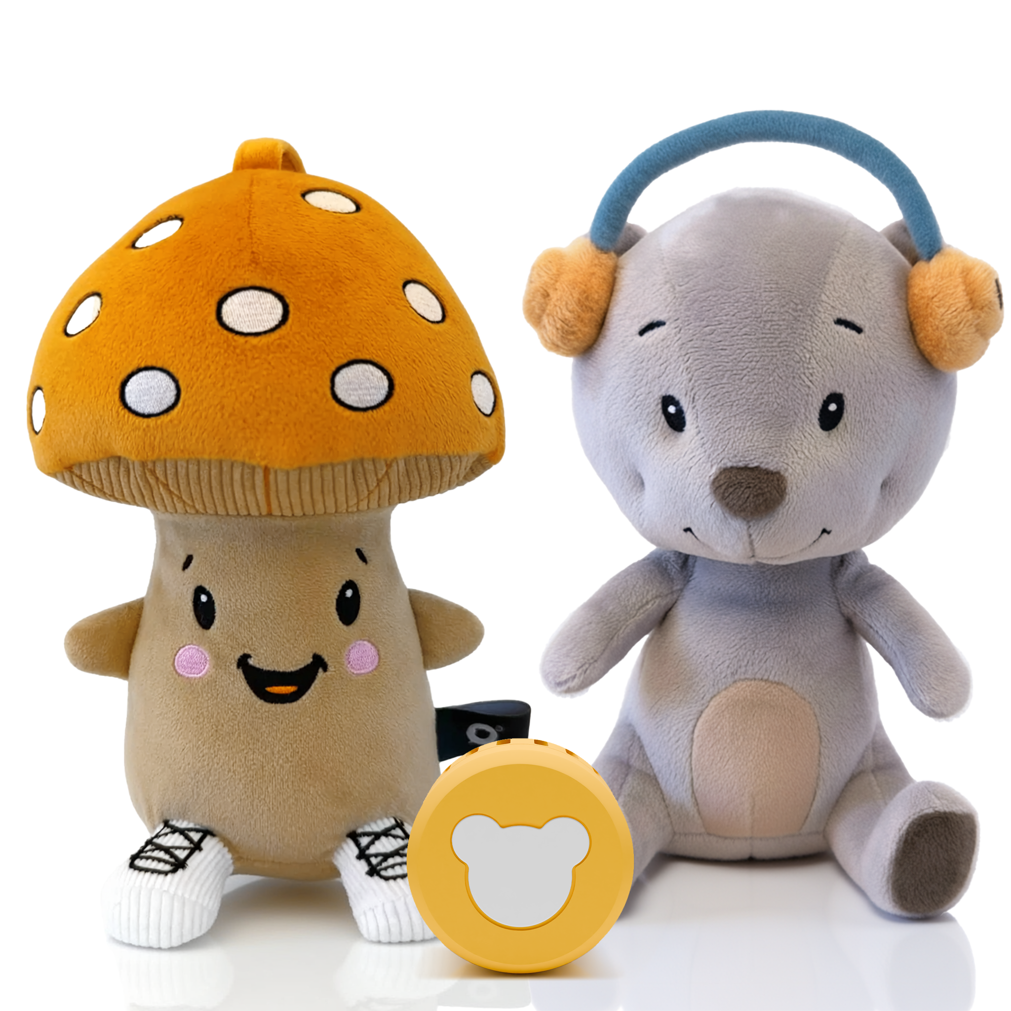 Ein Pilz-Plüschtier und ein Teddybär mit Kopfhörern sitzen nebeneinander.