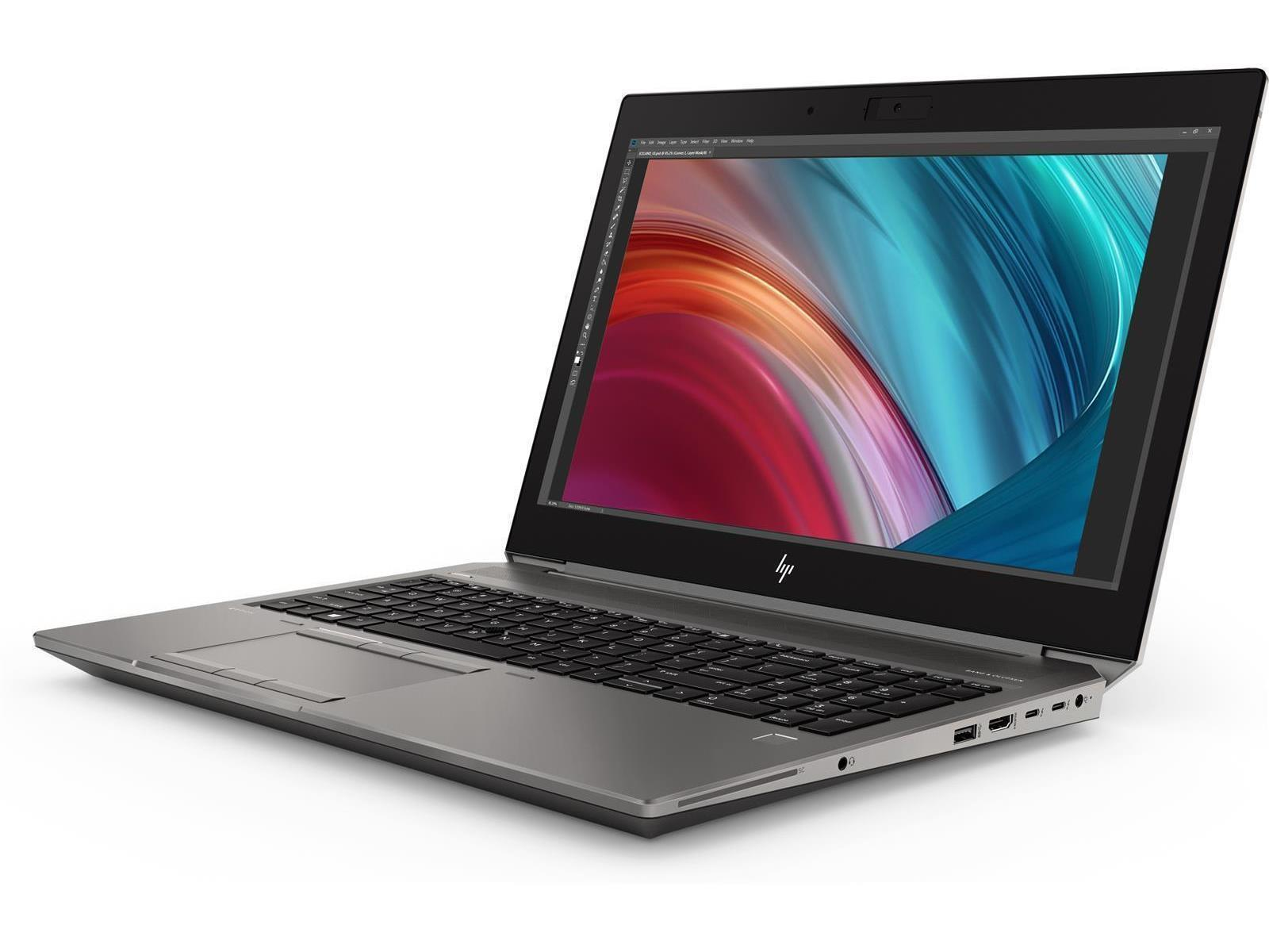 Ein grauer Laptop mit einem bunten Hintergrund auf dem Bildschirm.
