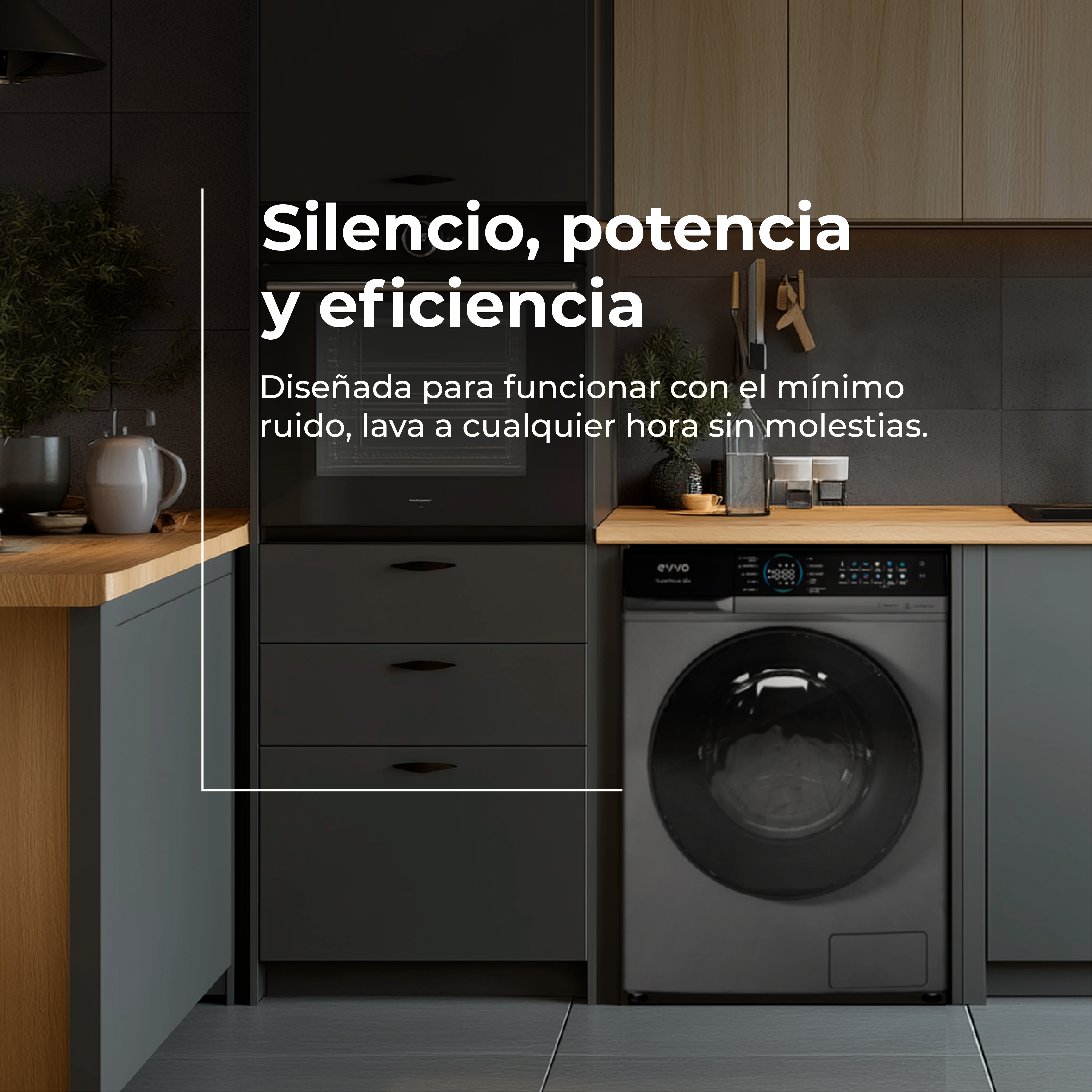 Una lavadora junto a armarios de cocina oscuros bajo una encimera de madera.