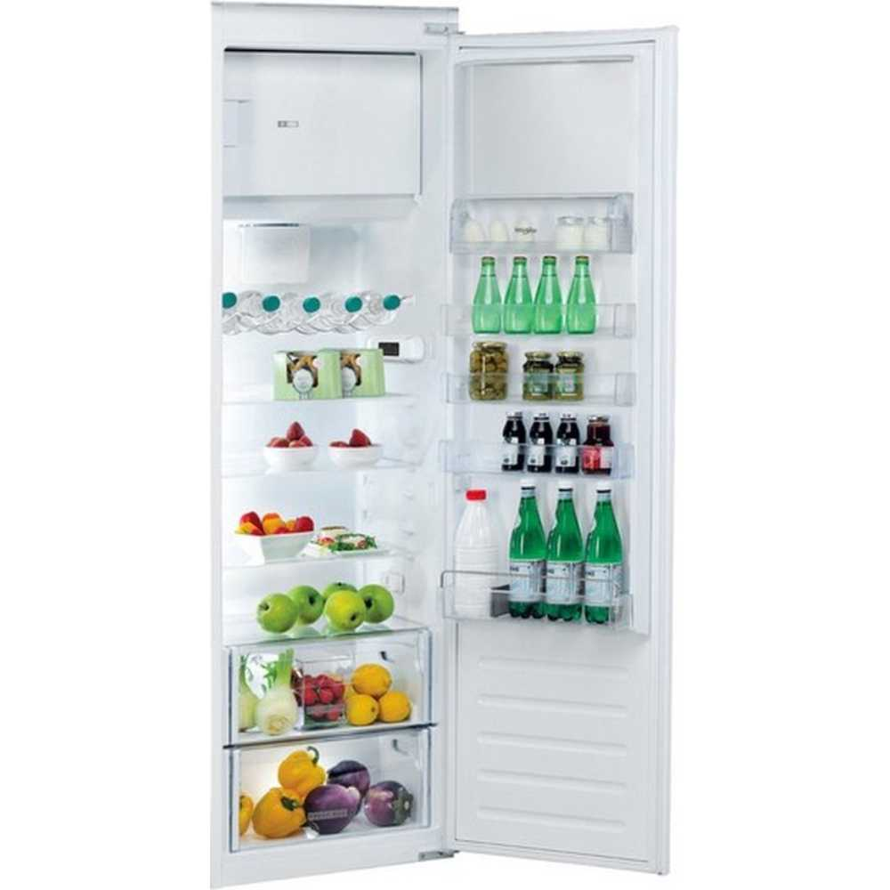 An open white refrigerator filled with food, including fruits, vegetables, and drinks.