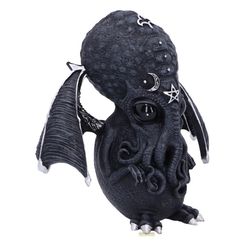Eine kleine, schwarze, gotische Figur mit Flügeln, Mond und Sternen auf dem Kopf.
