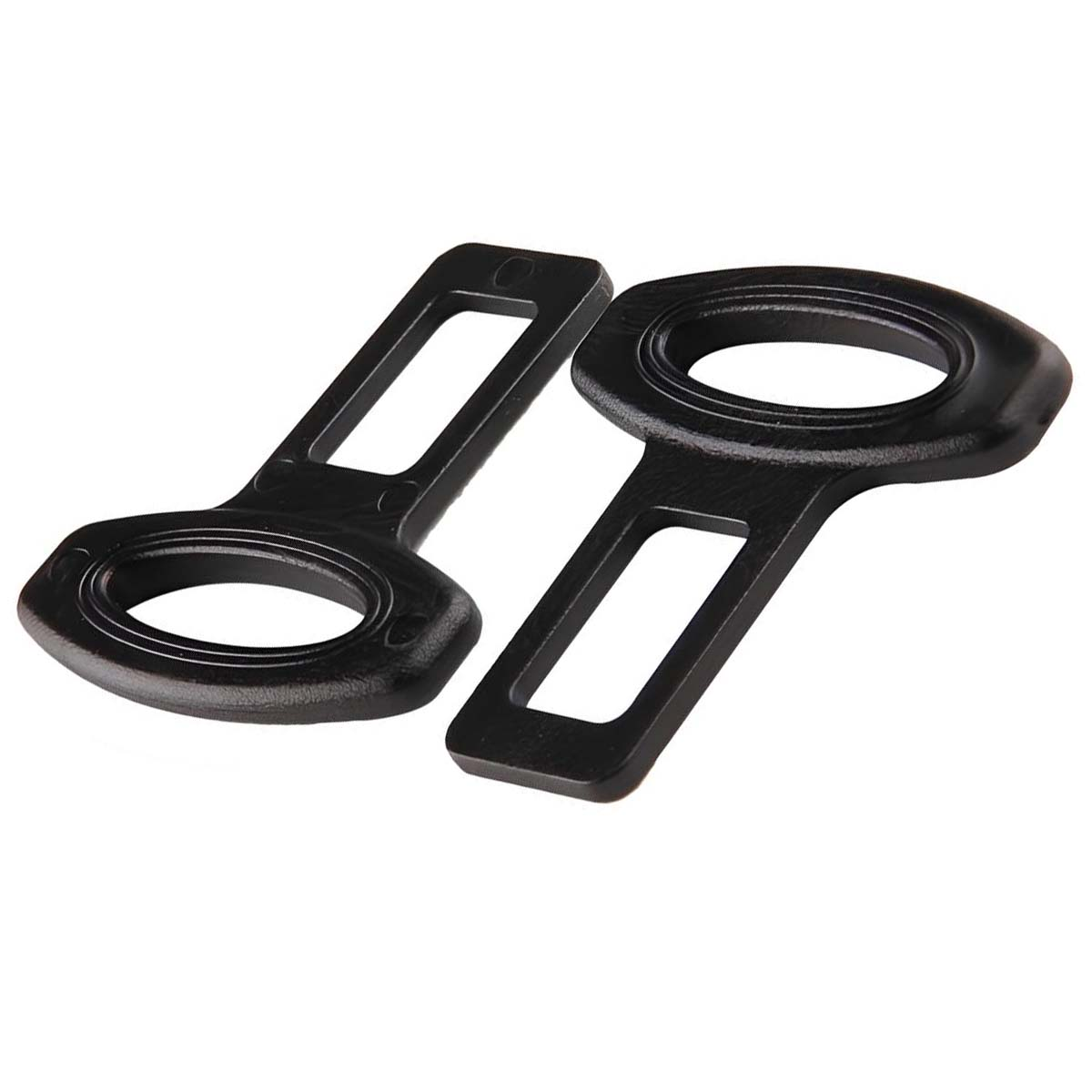 Due fibbie nere in plastica per cintura di sicurezza su sfondo bianco.