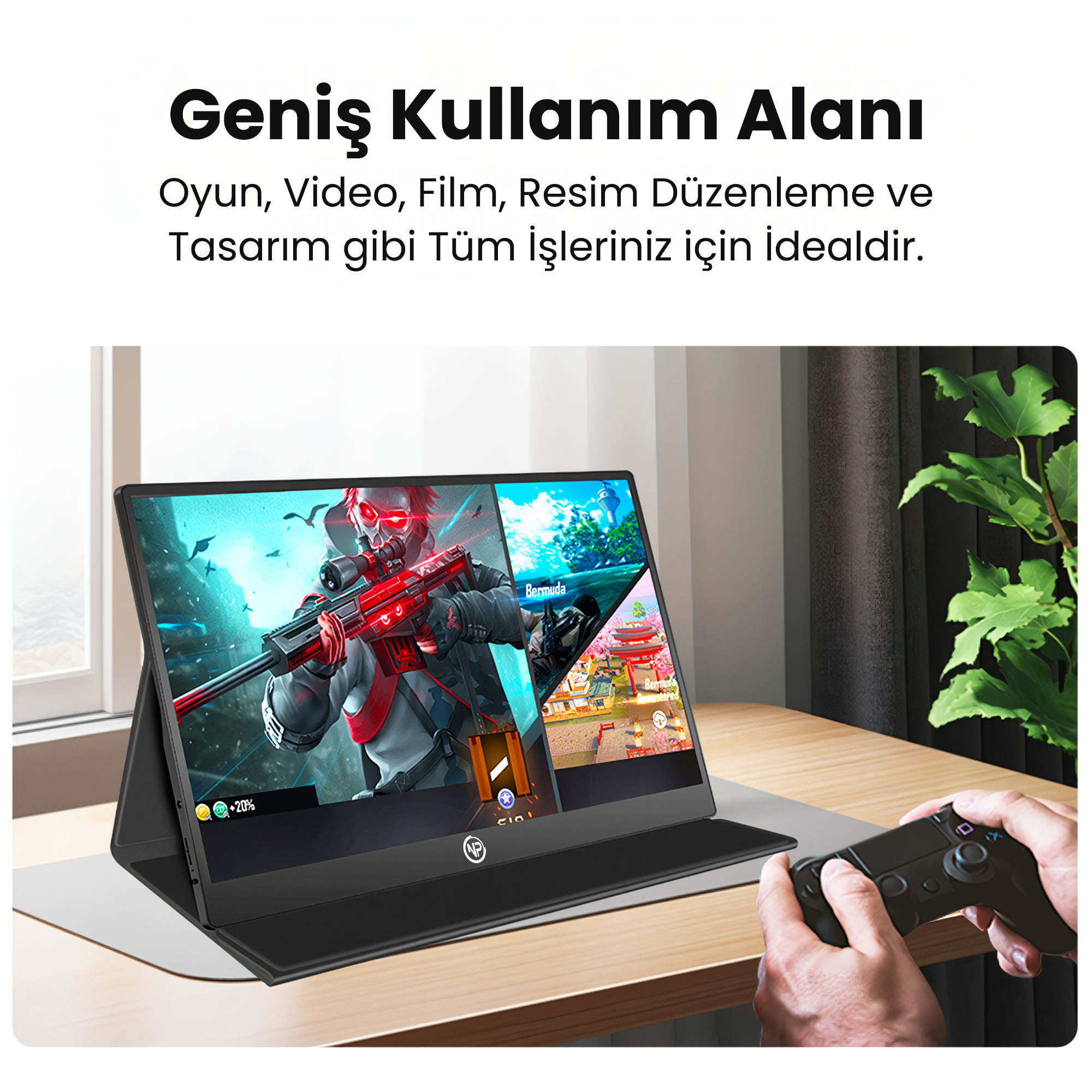 Bir adam masanın üzerine yerleştirilmiş taşınabilir bir monitörde oyun oynuyor.
