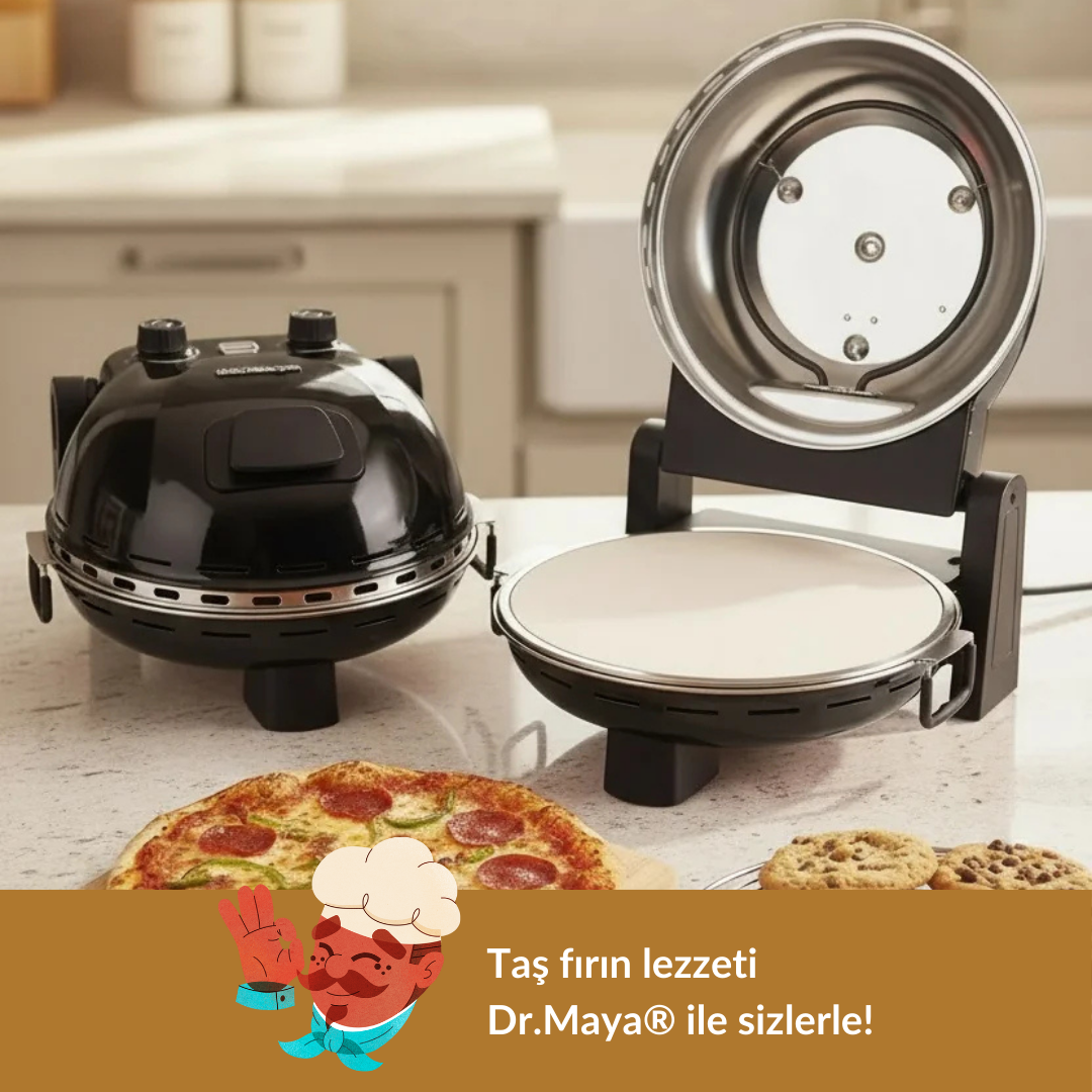 Pizza ve kurabiyelerin olduğu tezgahta siyah ve açık bir pizza fırını.