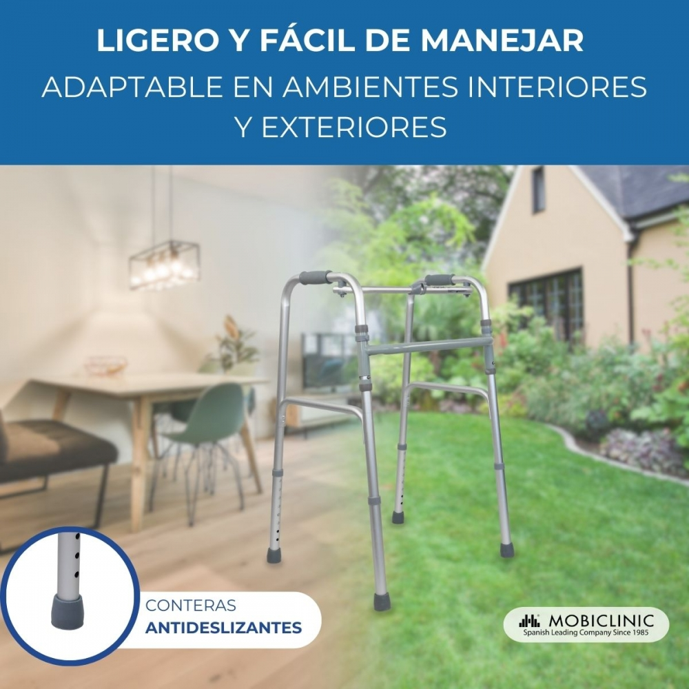 Un andador está en un jardín frente a una casa, con una mesa dentro.