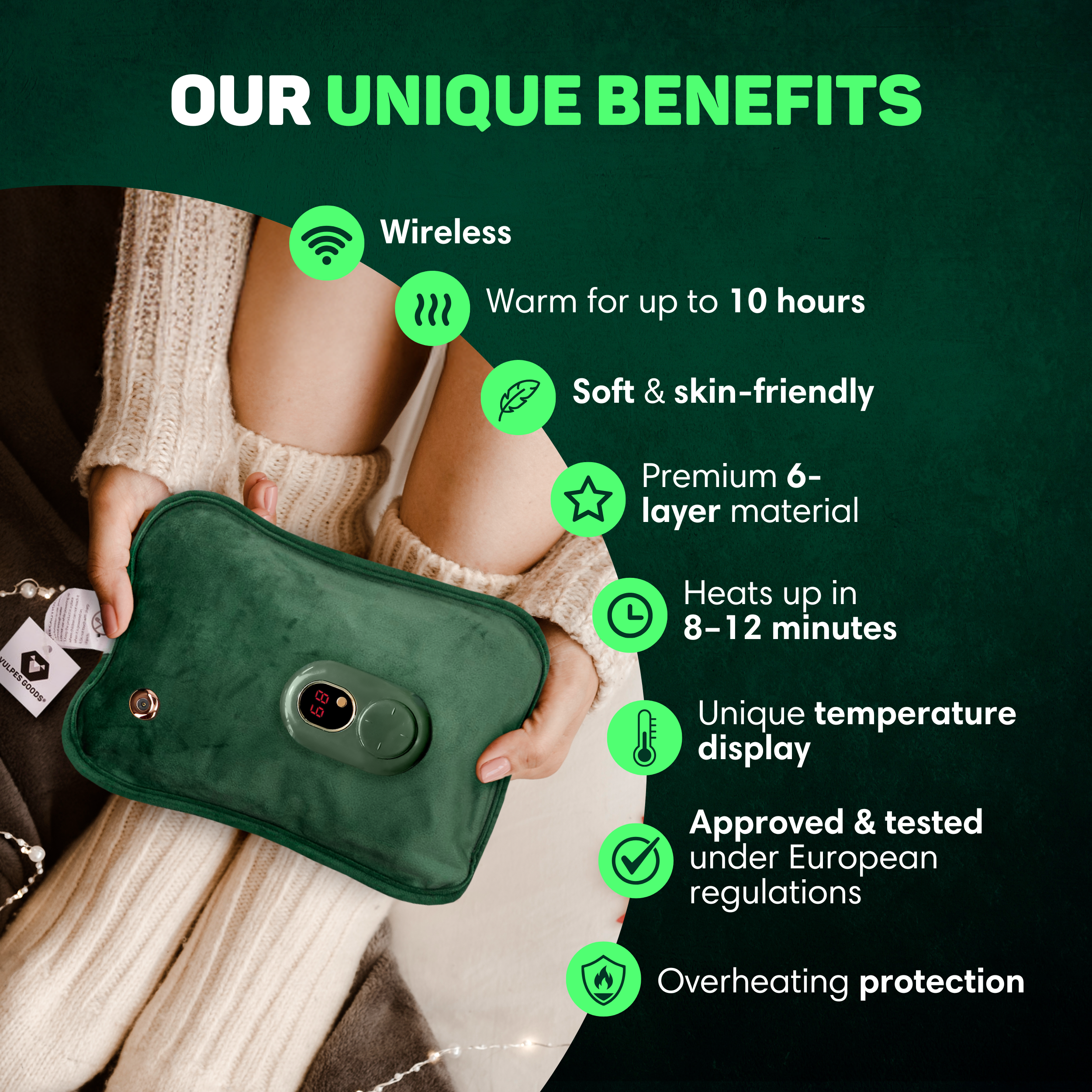 Green hot water bottle with LCD display held by a person in a knitted sweater.