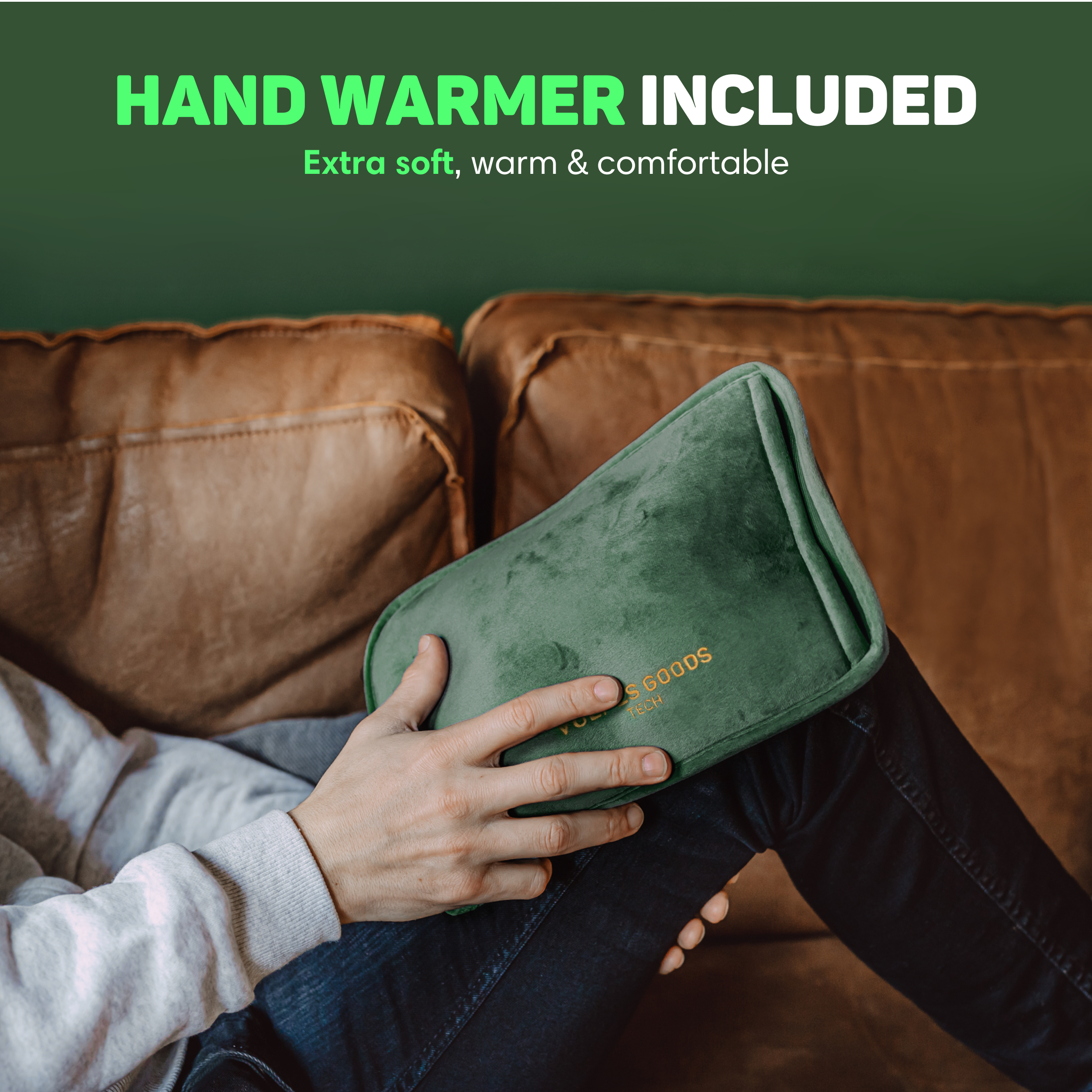 A person holds a dark green hand warmer bag on their lap.