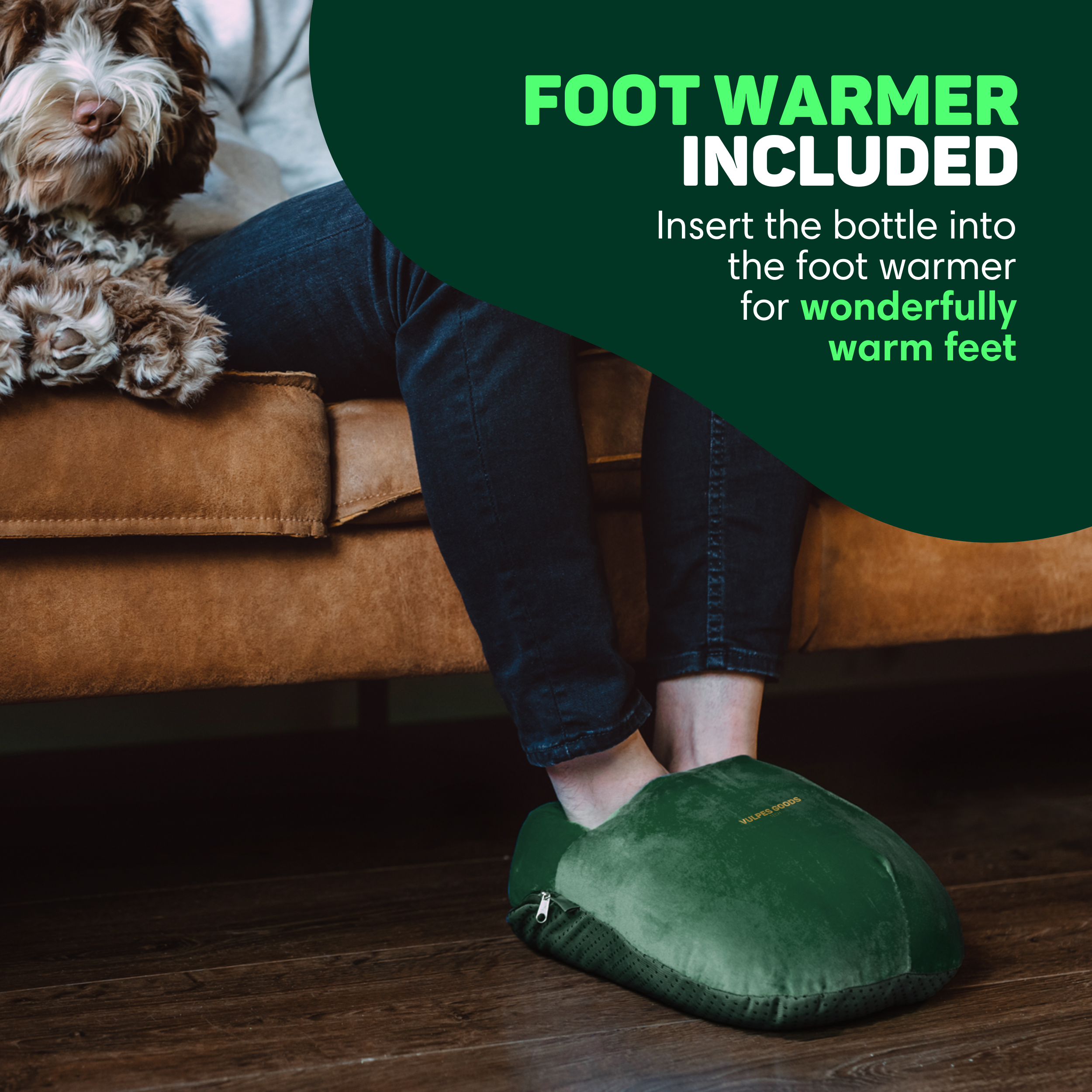 A dog sits next to feet in a green foot warmer.