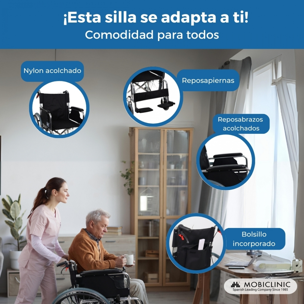 Una cuidadora empuja a un anciano en silla de ruedas con una taza.