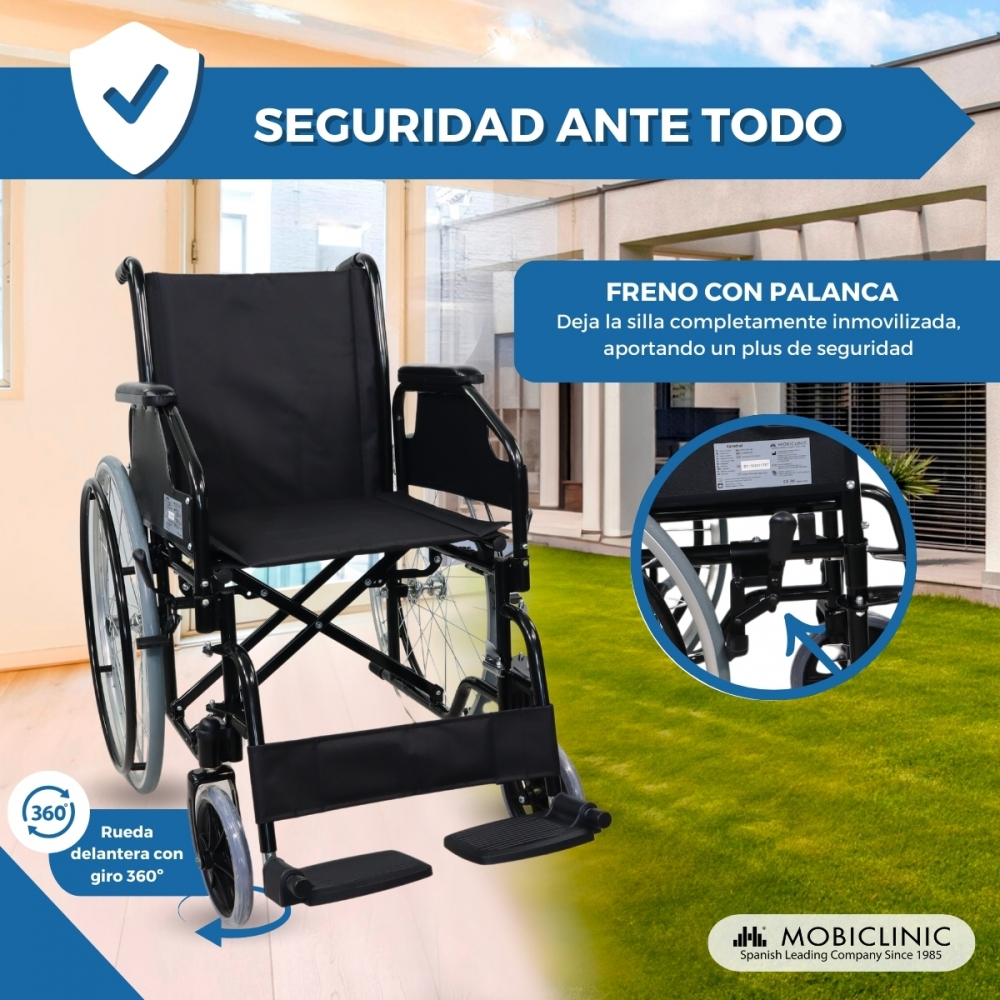 Una silla de ruedas negra con rueda trasera grande y rueda delantera pequeña.